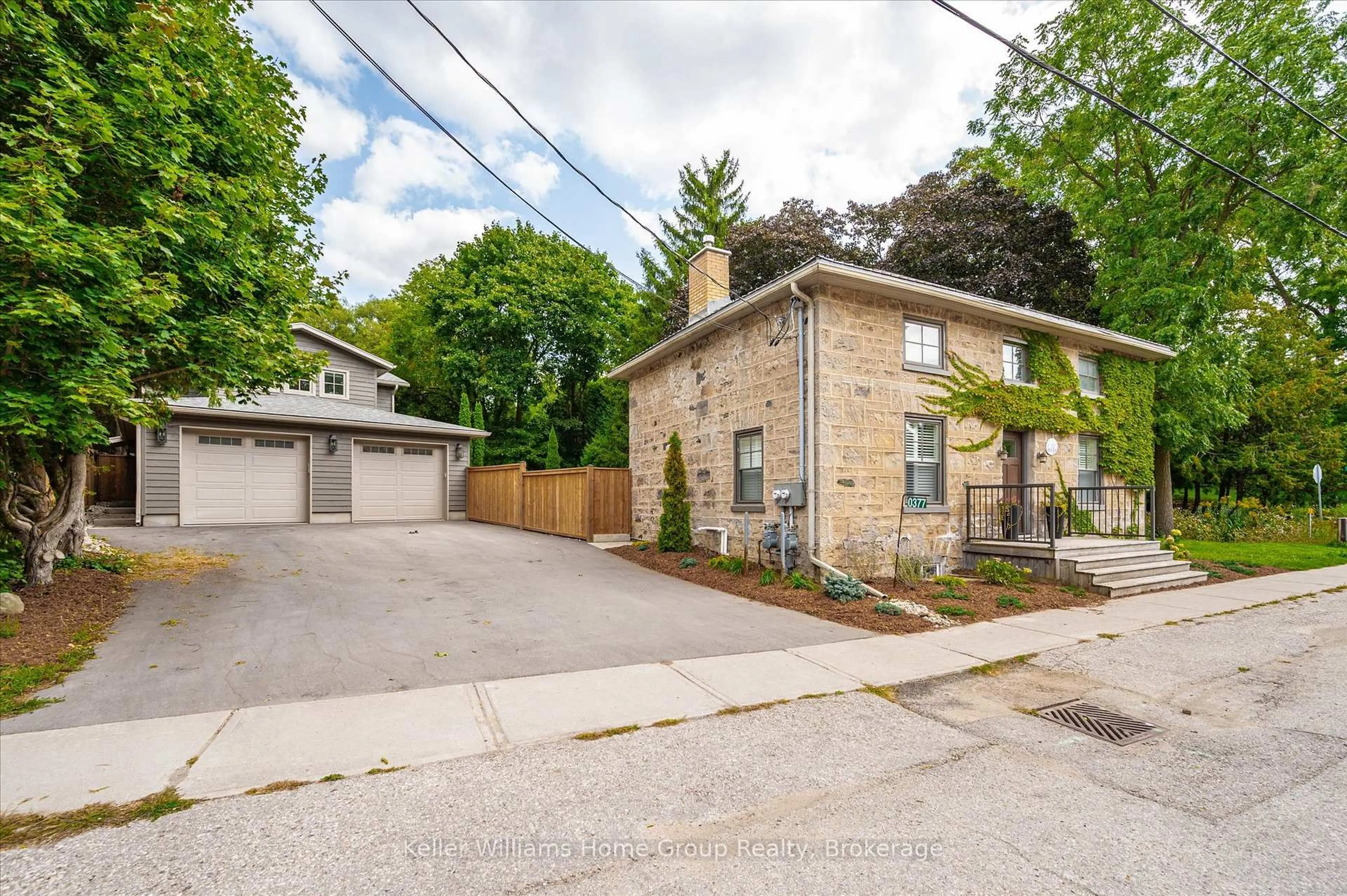 A pic from outside/outdoor area/front of a property/back of a property/a pic from drone, street for 377 Geddes St, Centre Wellington Ontario N0B 1S0