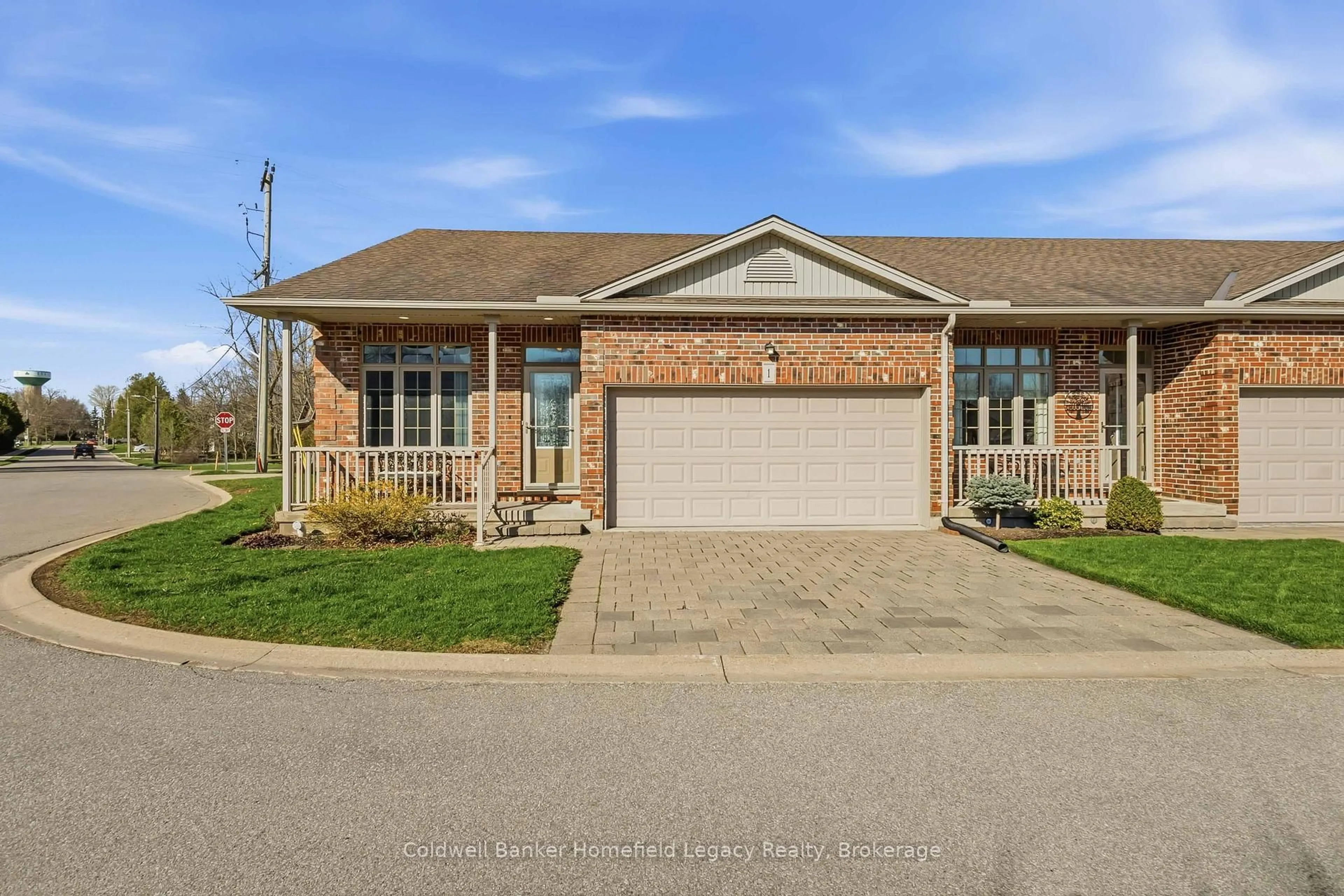 Home with brick exterior material, street for 220 Walnut St #1, Lucan Biddulph Ontario N0M 2J0