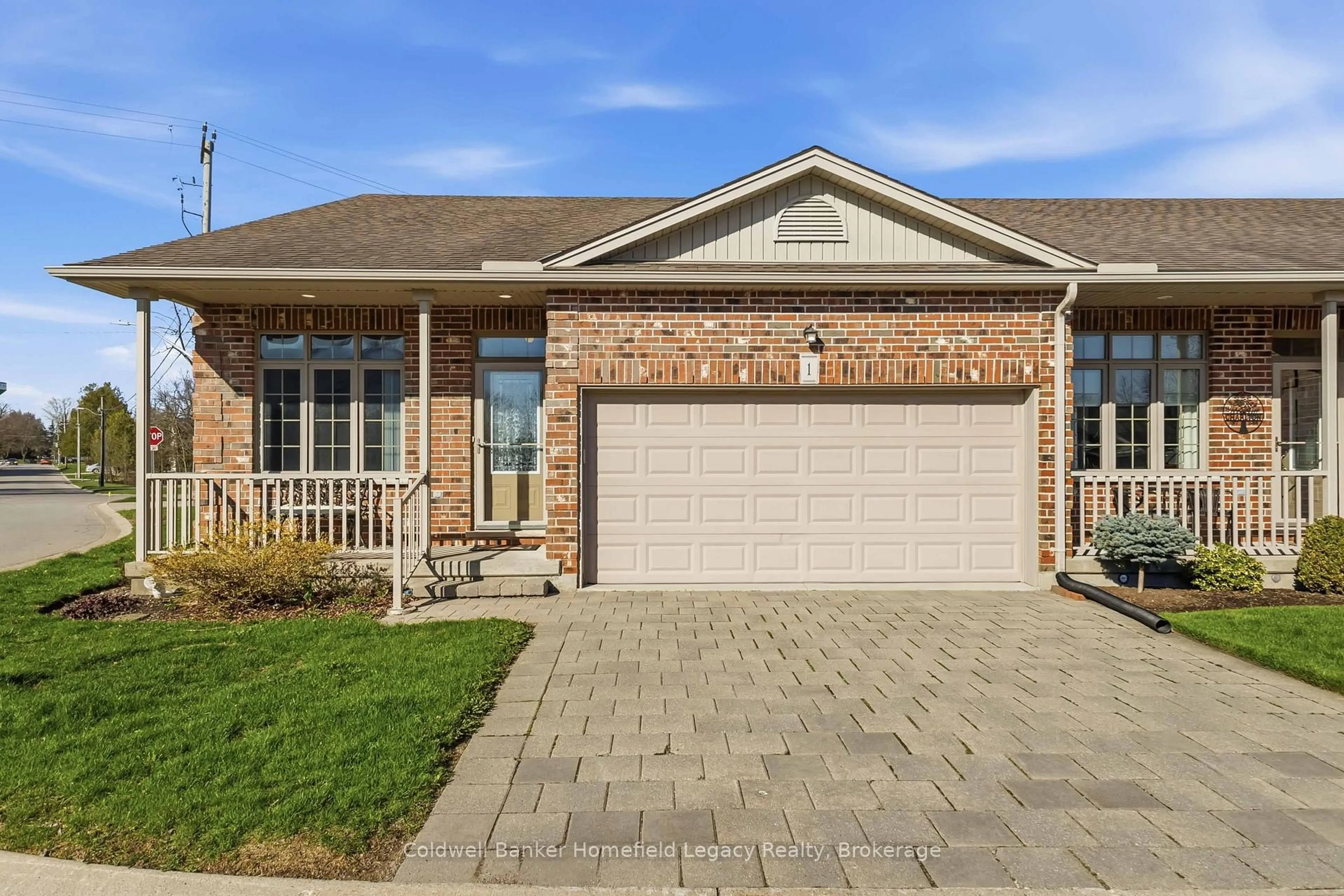 Home with brick exterior material, street for 220 Walnut St #1, Lucan Biddulph Ontario N0M 2J0