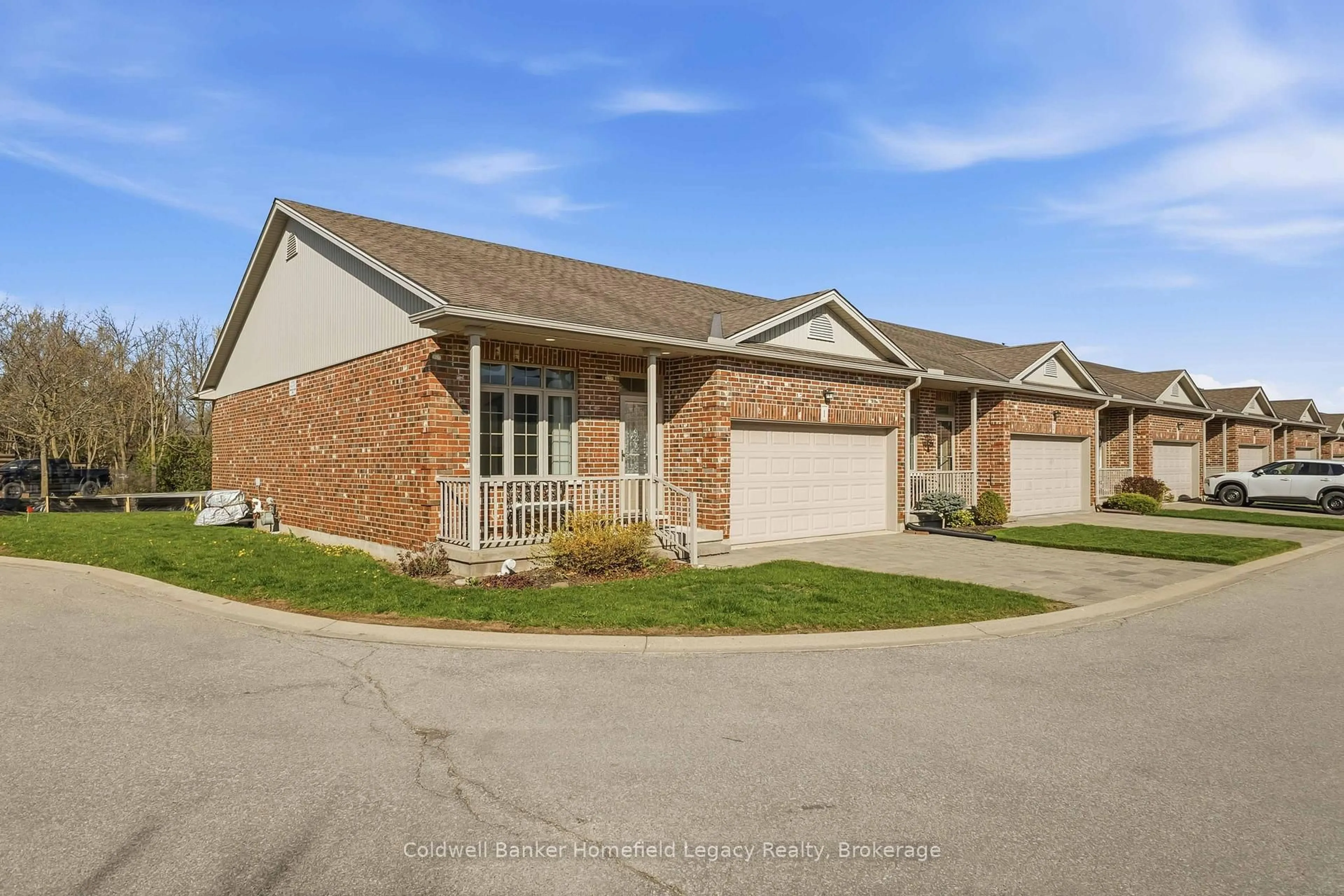 Home with brick exterior material, street for 220 Walnut St #1, Lucan Biddulph Ontario N0M 2J0
