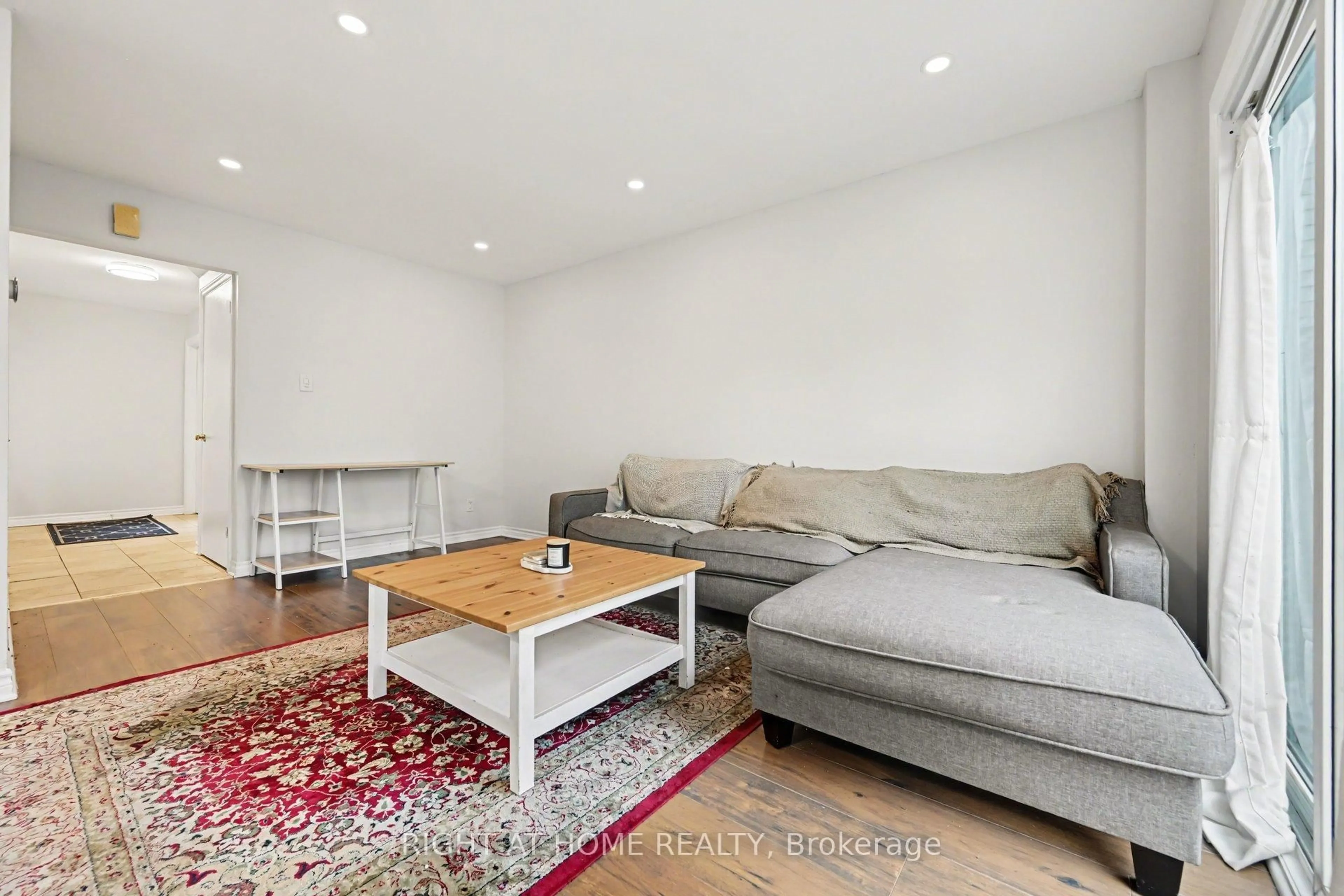 Living room with furniture, wood/laminate floor for 6 Wolfgang Dr, Nepean Ontario K2J 1T1