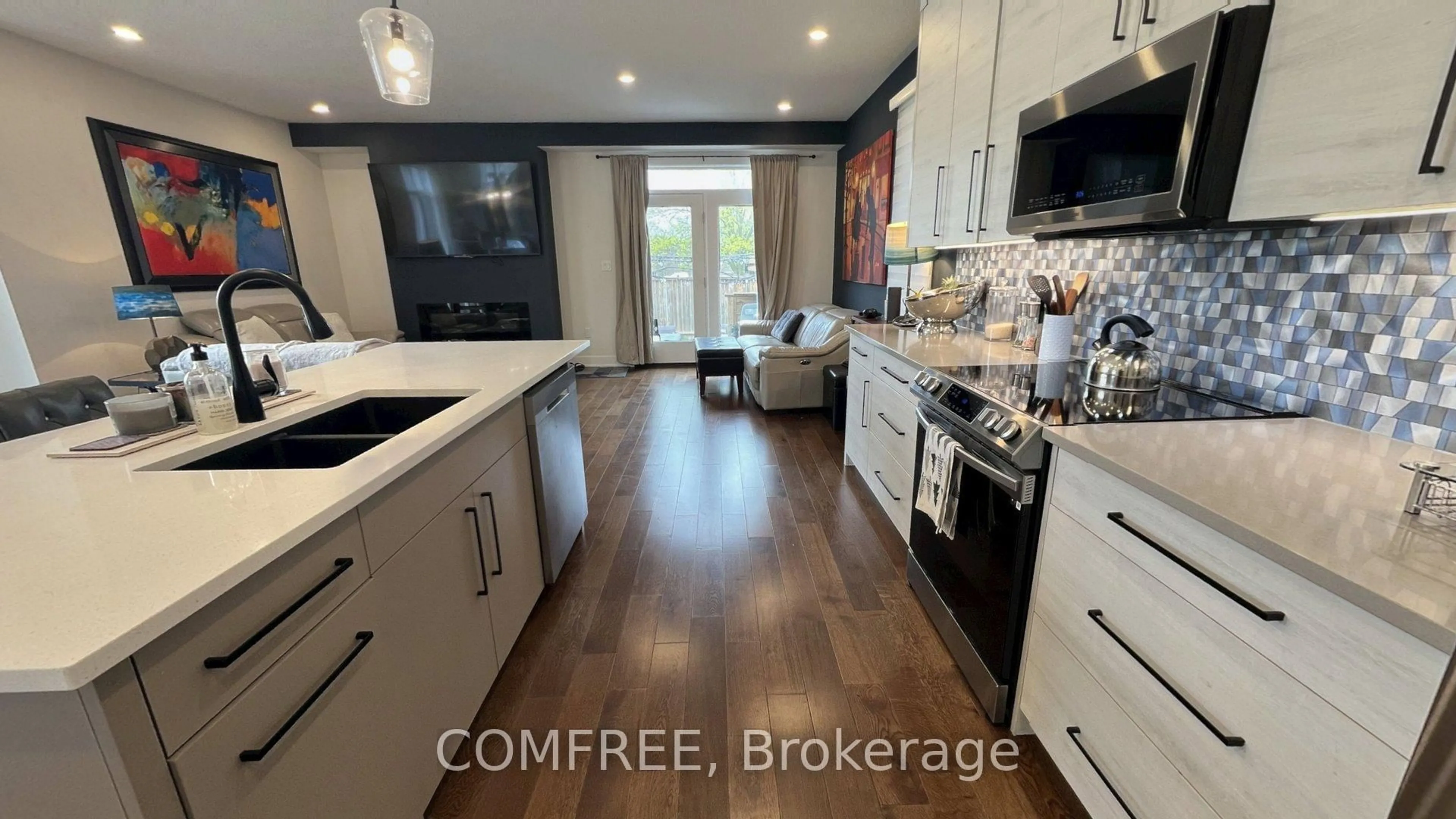 Open concept kitchen, unknown for 498 Phyllis St, London South Ontario N6G 0K5