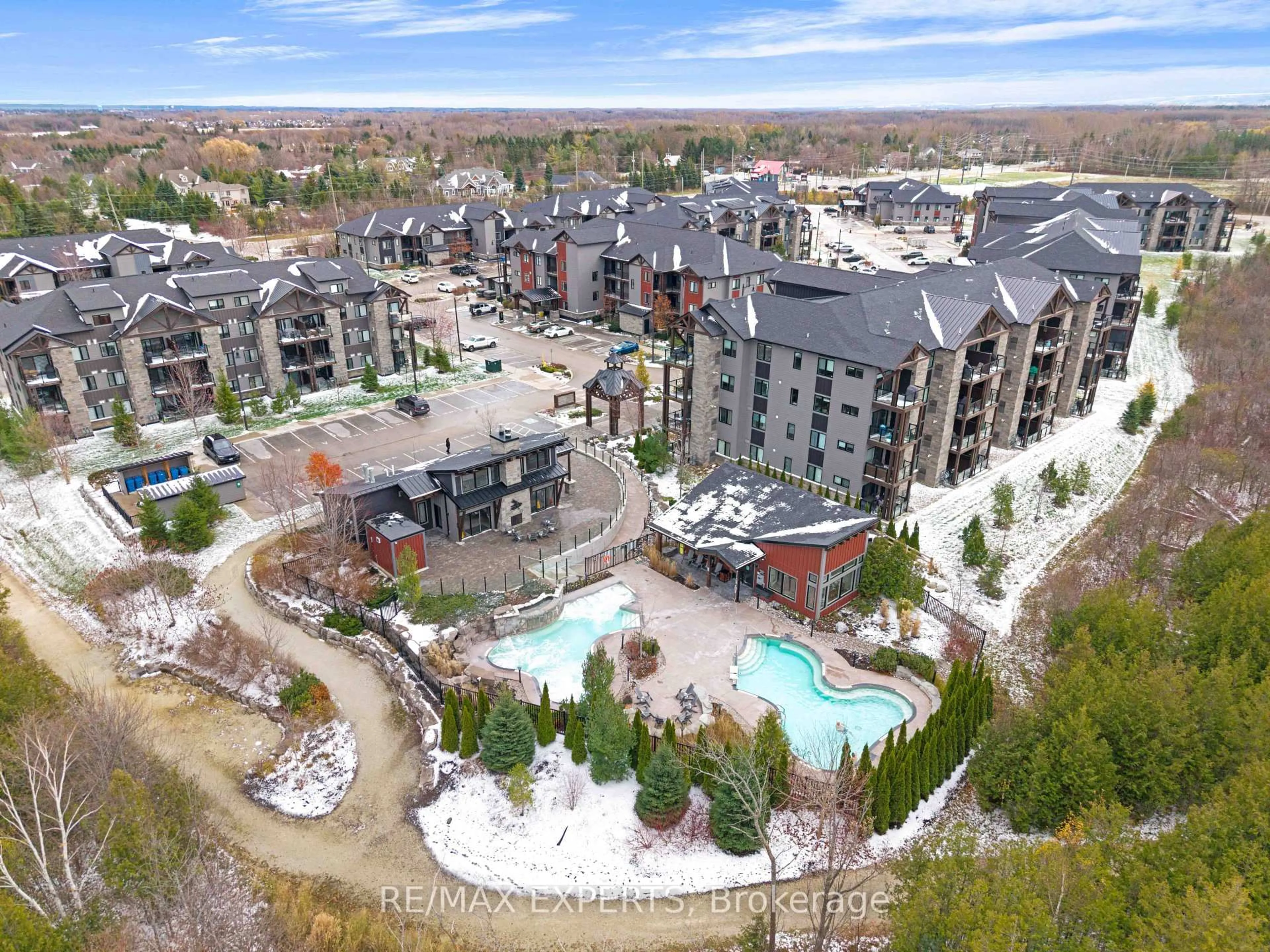 A pic from outside/outdoor area/front of a property/back of a property/a pic from drone, mountain view for 22 Beckwith Lane #101, Blue Mountains Ontario L9Y 3B6