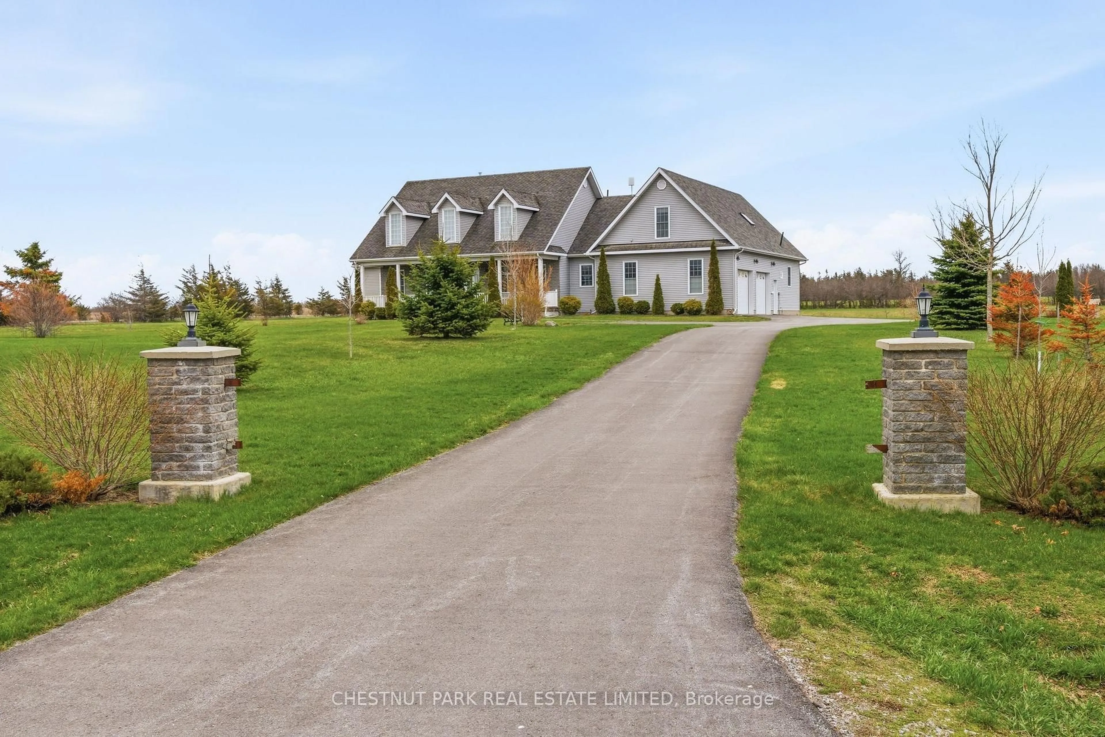 A pic from outside/outdoor area/front of a property/back of a property/a pic from drone, street for 1167 County Rd 18, Prince Edward County Ontario K0K 1P0