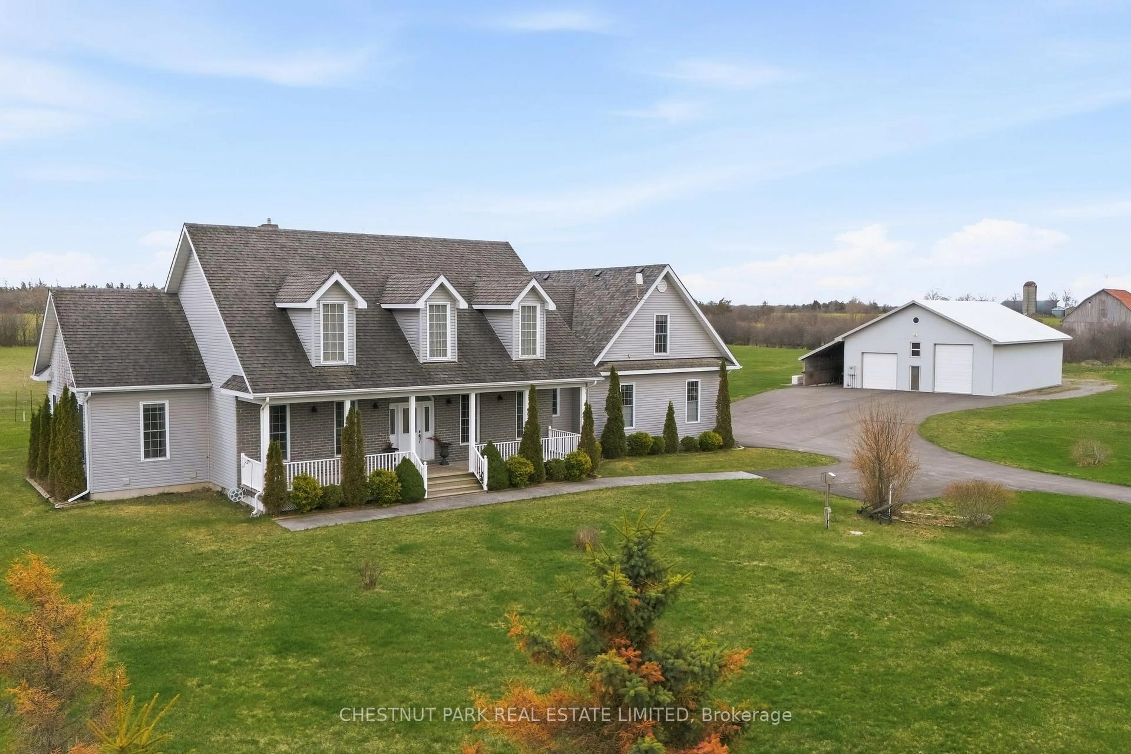 A pic from outside/outdoor area/front of a property/back of a property/a pic from drone, mountain view for 1167 County Rd 18, Prince Edward County Ontario K0K 1P0