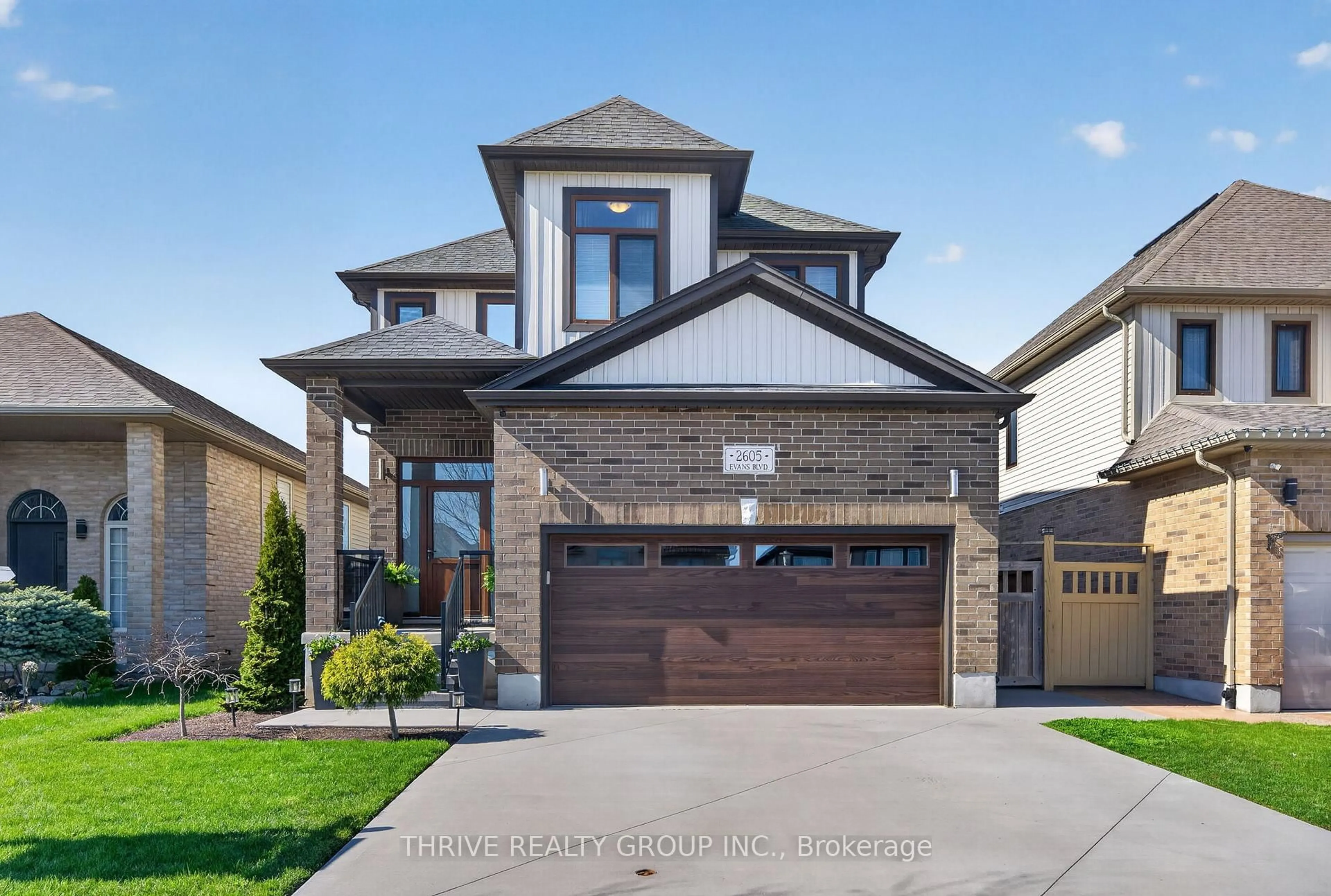 Home with brick exterior material, street for 2605 Evans Blvd, London South Ontario N6M 0B2