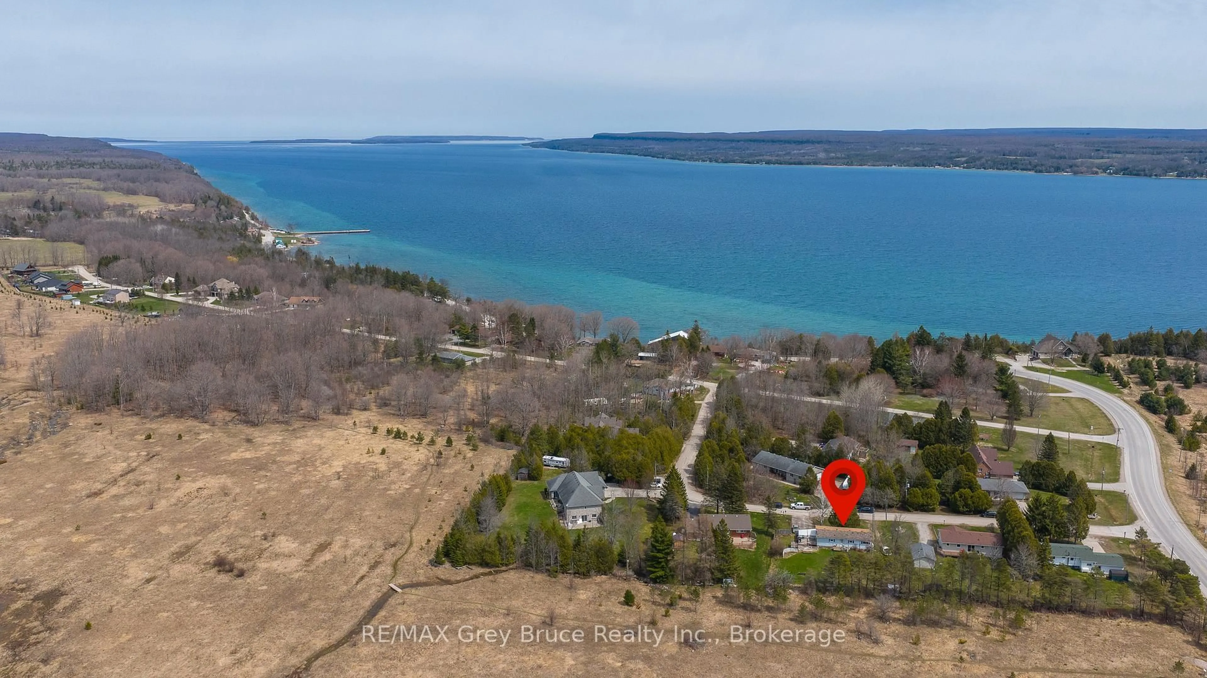 A pic from outside/outdoor area/front of a property/back of a property/a pic from drone, water/lake/river/ocean view for 9 Hector St, South Bruce Peninsula Ontario N0H 2T0
