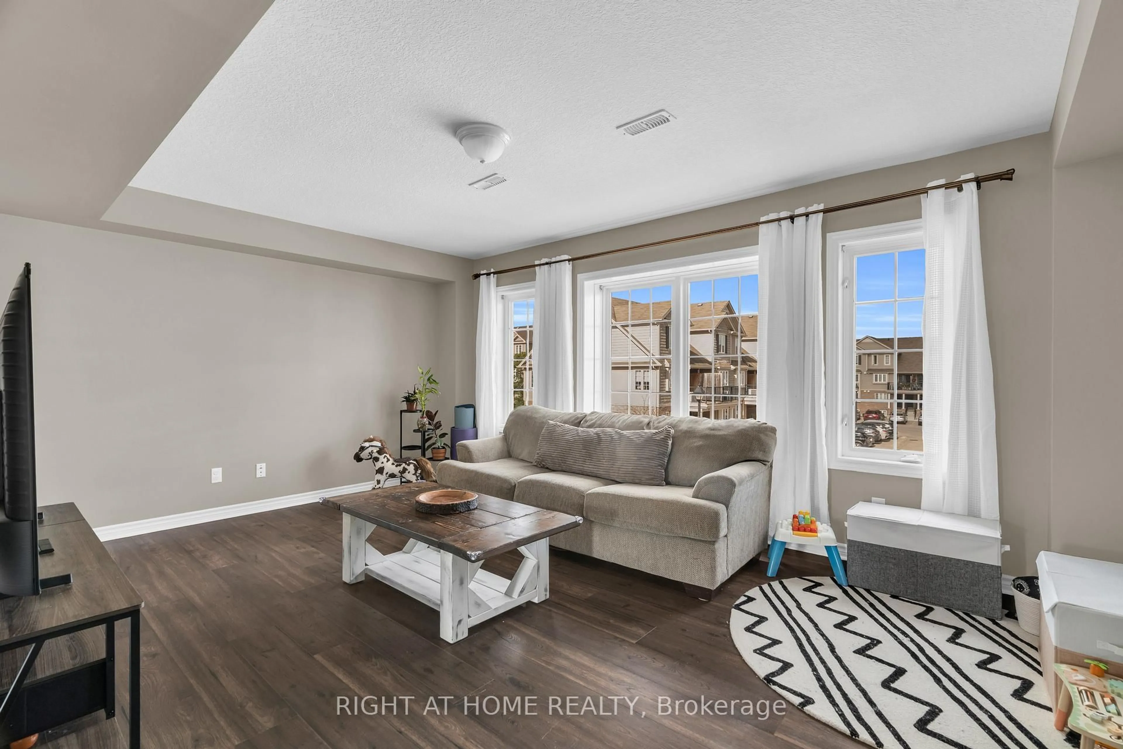 Living room with furniture, unknown for 630 Woodlawn Rd #B, Guelph Ontario N1E 0K4