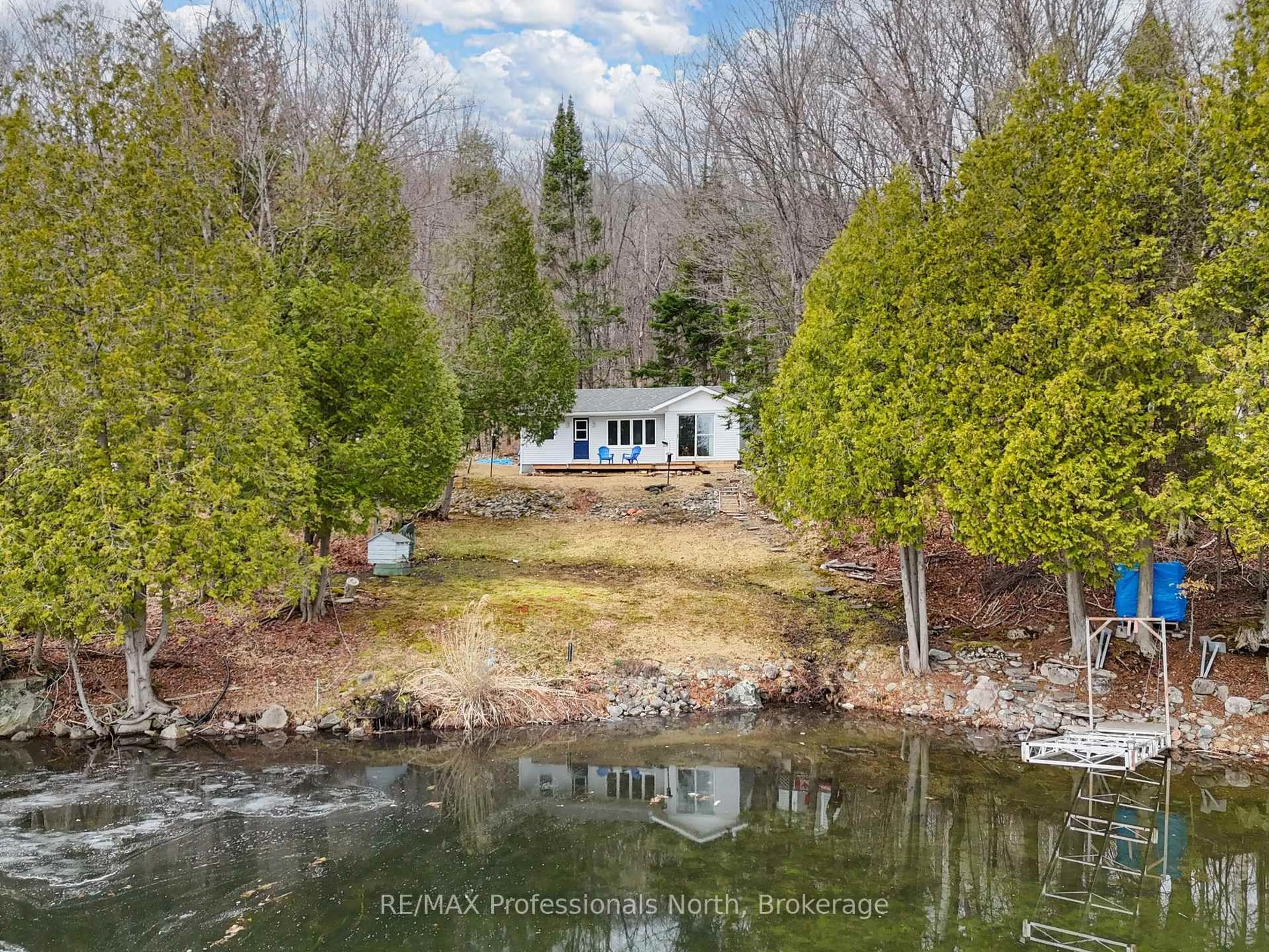 A pic from outside/outdoor area/front of a property/back of a property/a pic from drone, water/lake/river/ocean view for 223B Sunnylea Ave, Armour Ontario P0A 1J0