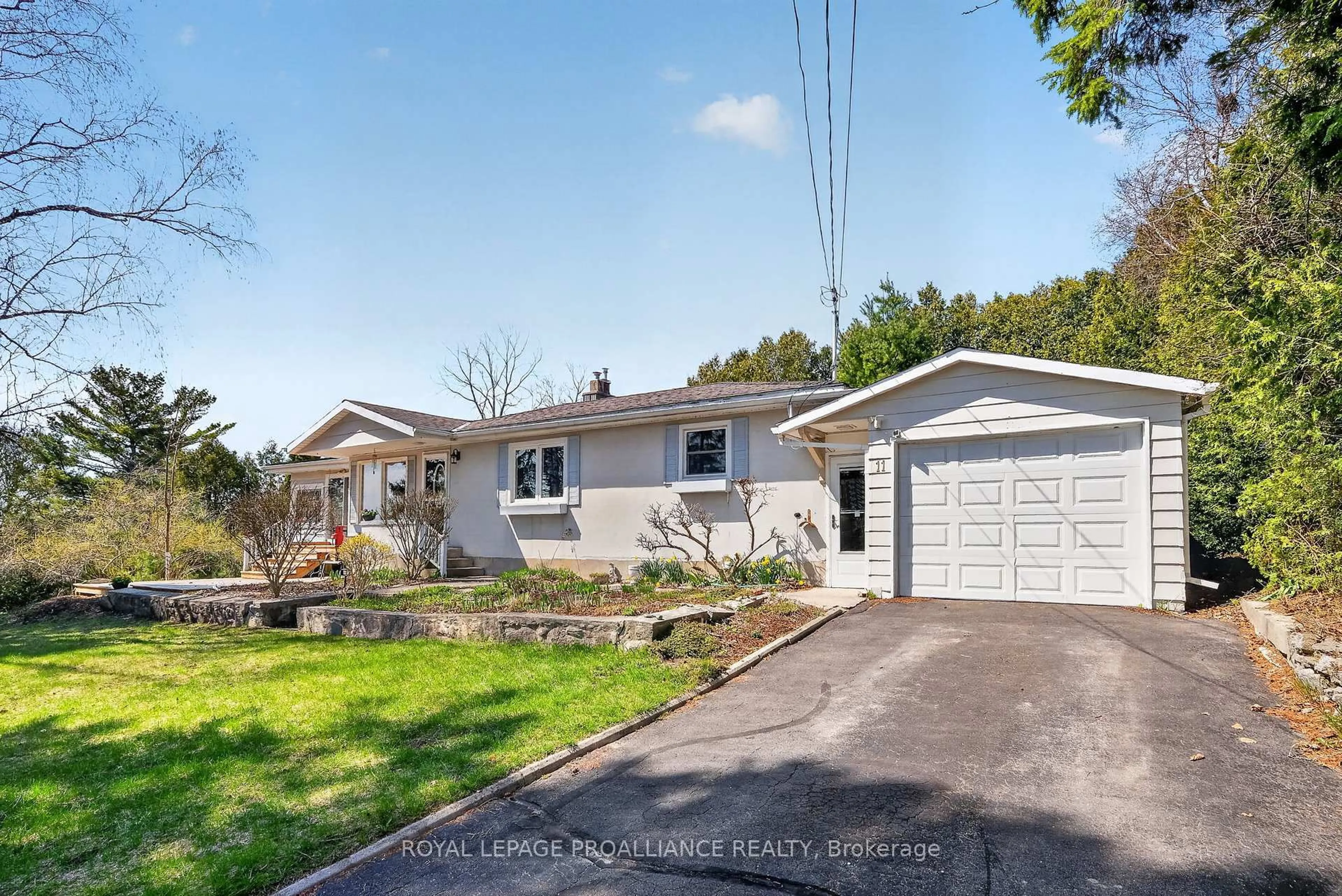 Home with vinyl exterior material, street for 11 Cedar St, Cramahe Ontario K0K 1S0