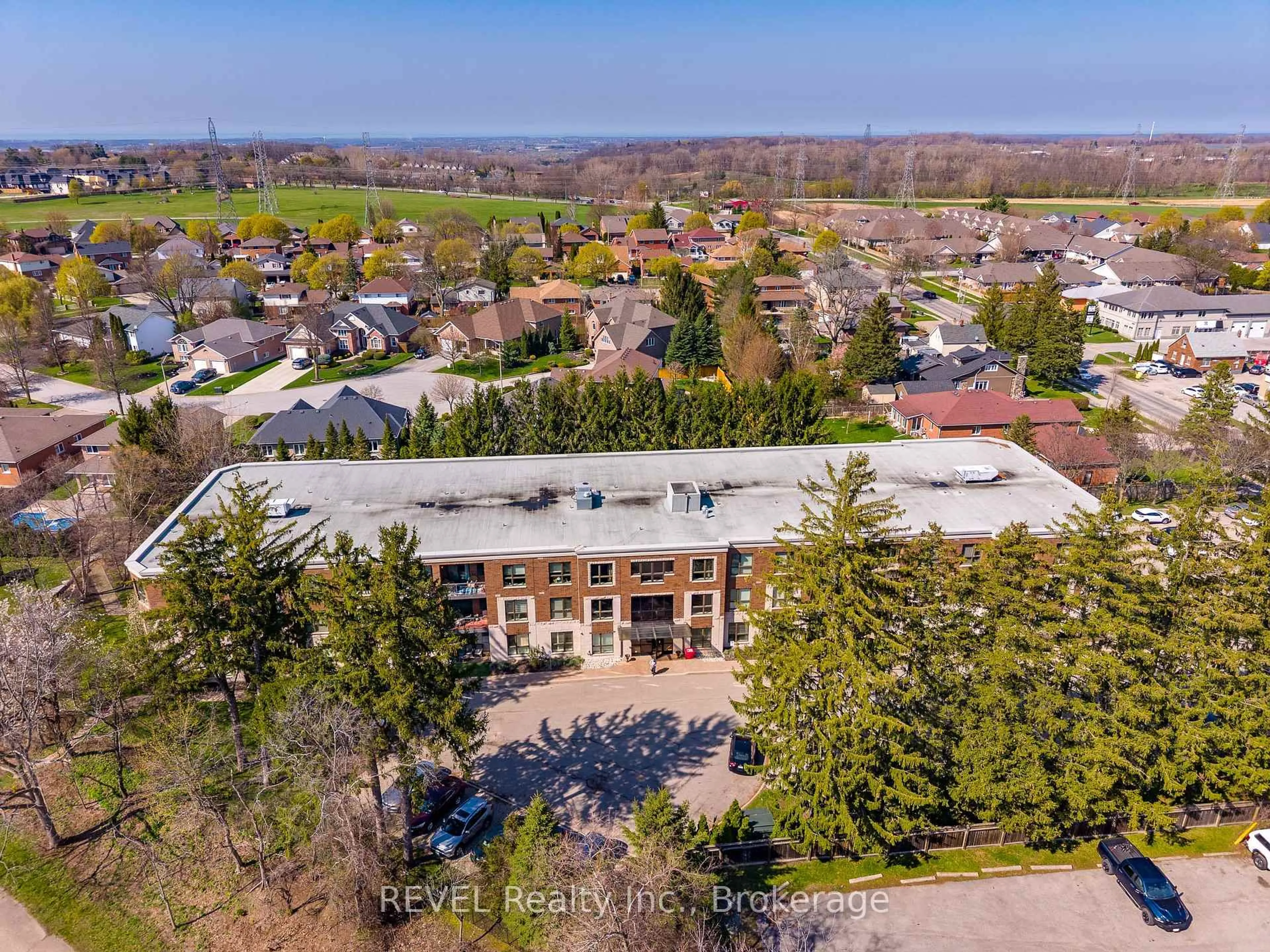 A pic from outside/outdoor area/front of a property/back of a property/a pic from drone, unknown for 2799 St. Paul Ave #212, Niagara Falls Ontario L2J 2L3
