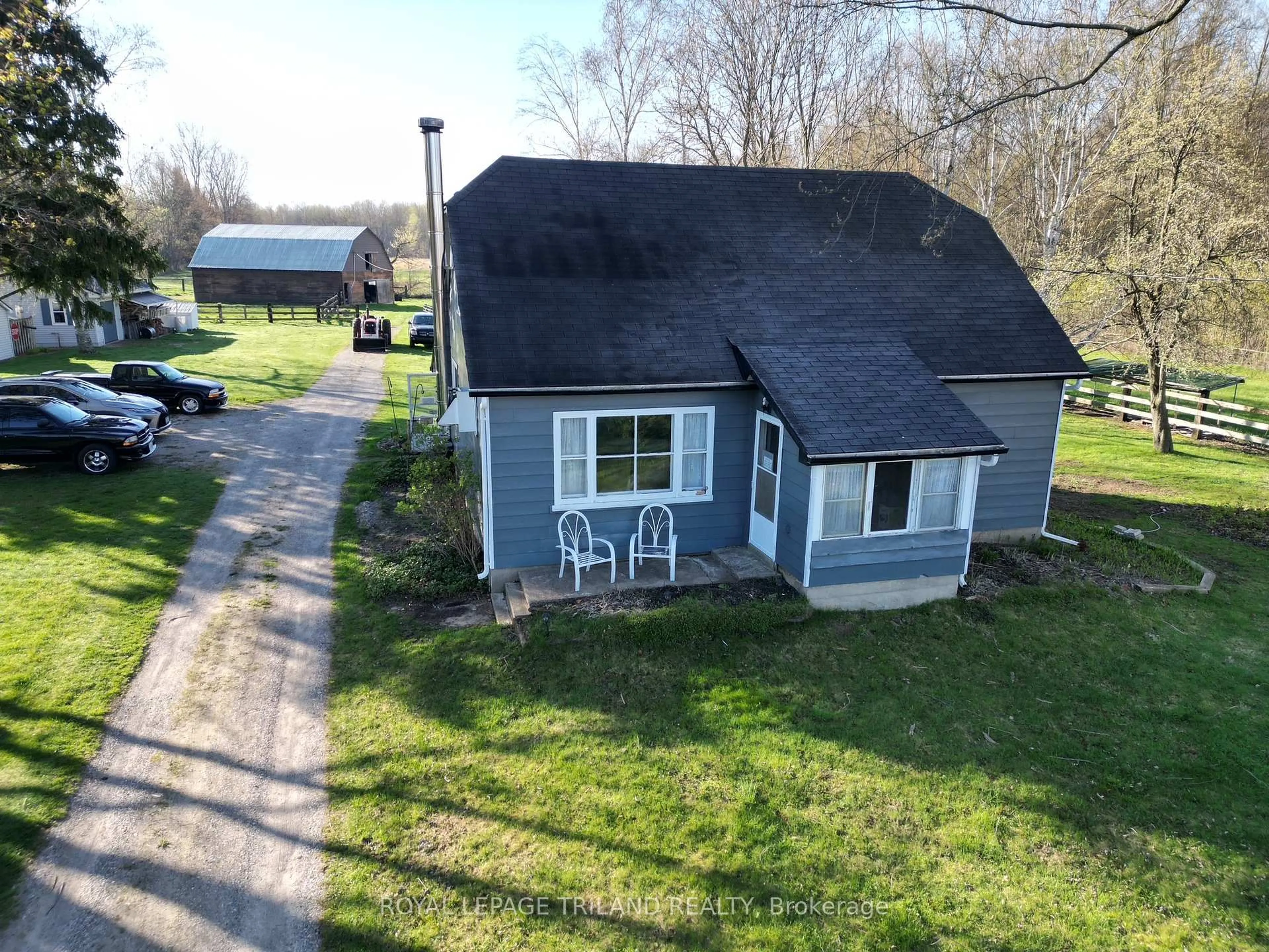A pic from outside/outdoor area/front of a property/back of a property/a pic from drone, unknown for 24909 Queens Line, West Elgin Ontario N0L 2P0