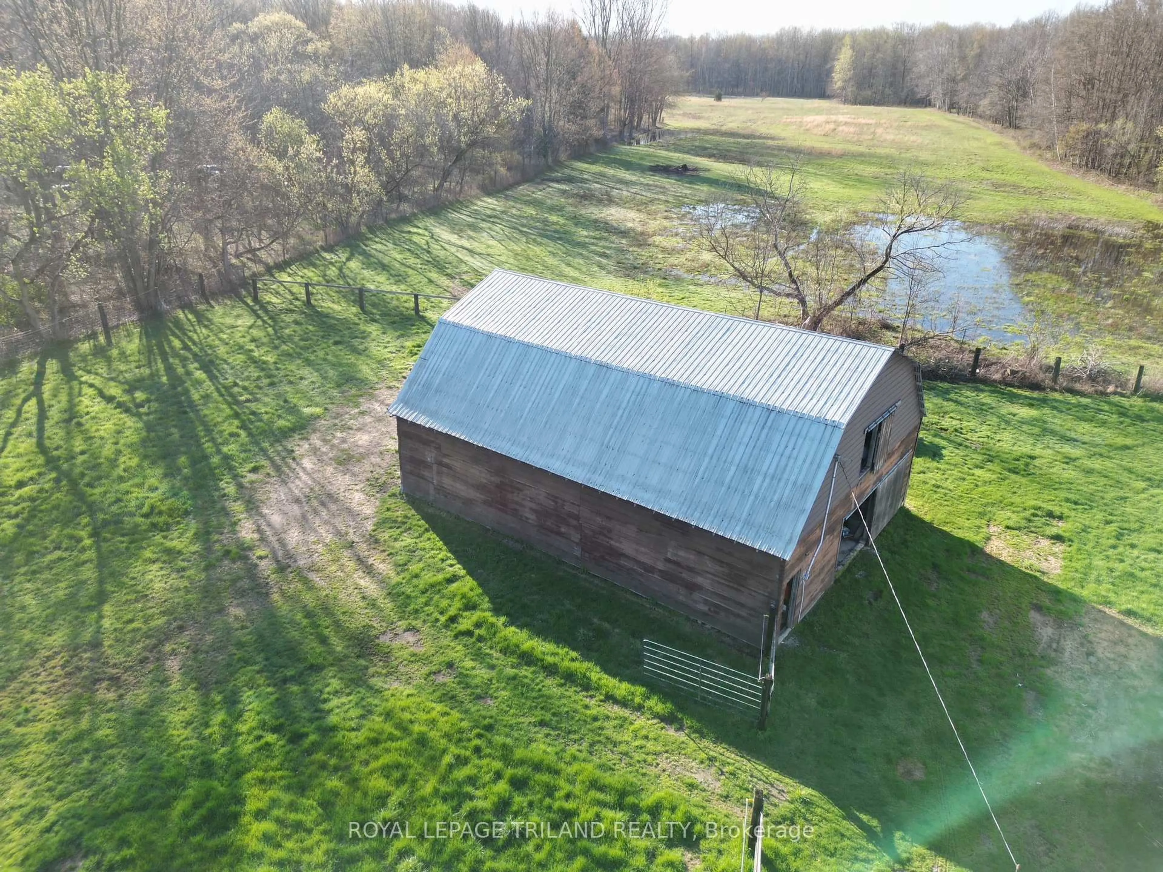 A pic from outside/outdoor area/front of a property/back of a property/a pic from drone, unknown for 24909 Queens Line, West Elgin Ontario N0L 2P0
