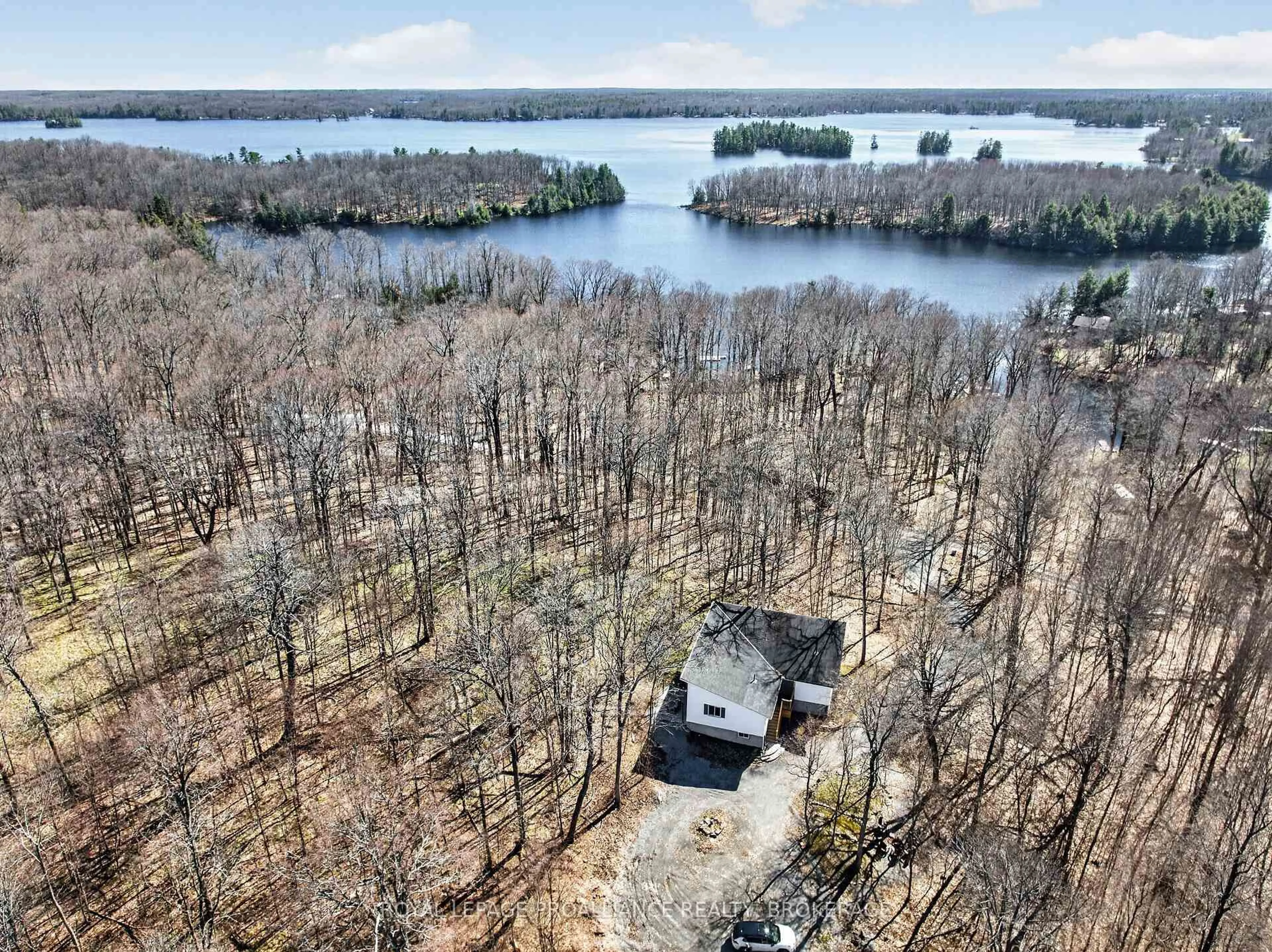 A pic from outside/outdoor area/front of a property/back of a property/a pic from drone, water/lake/river/ocean view for 289 MAPLE GROVE Lane, Tichborne Ontario K0H 2V0