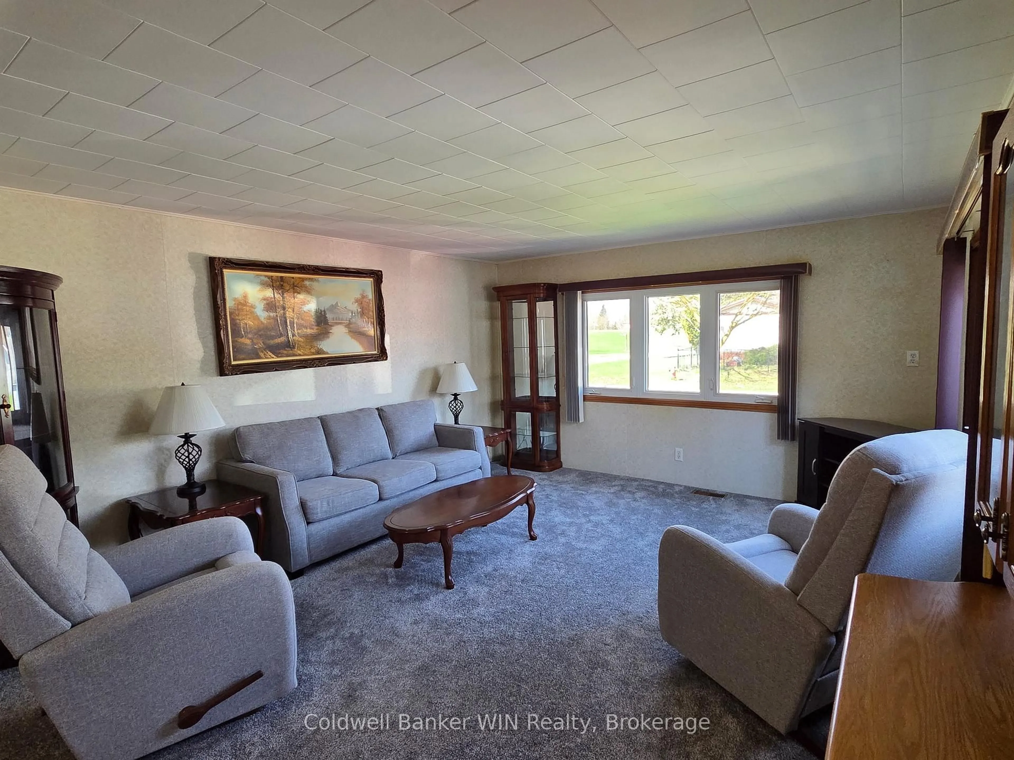 Living room with furniture, unknown for 19 York Mews, Minto Ontario N0G 2P0