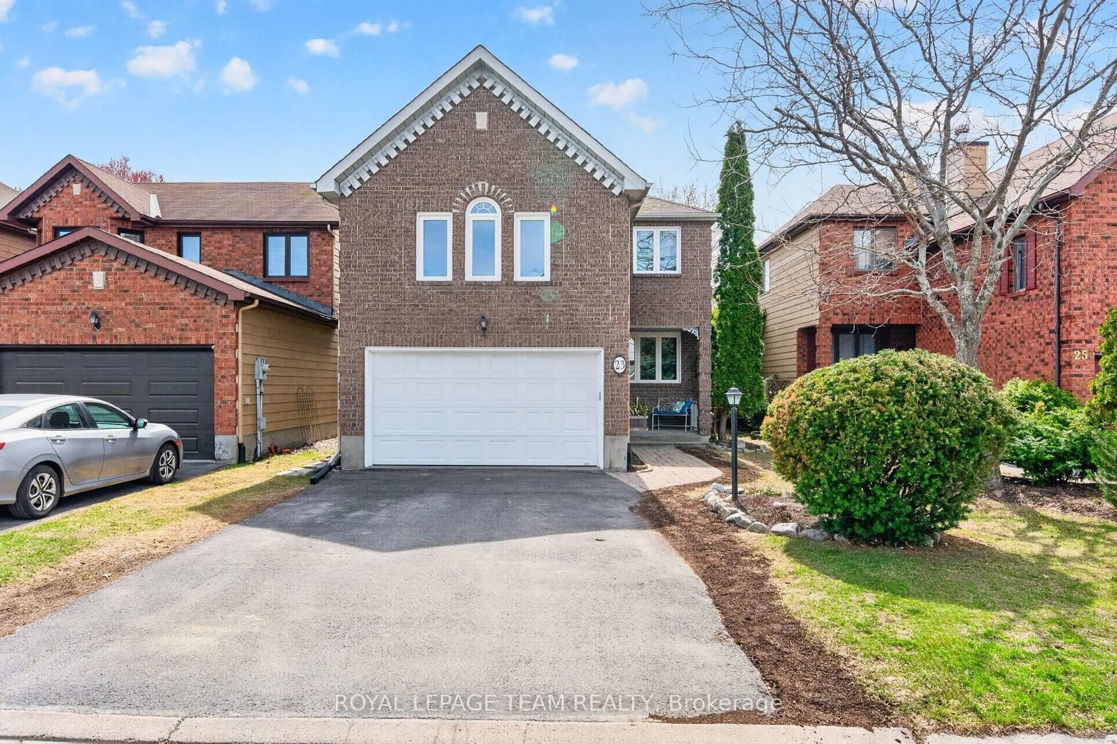 Home with brick exterior material, street for 23 Inwood Dr, Kanata Ontario K2M 1Z6