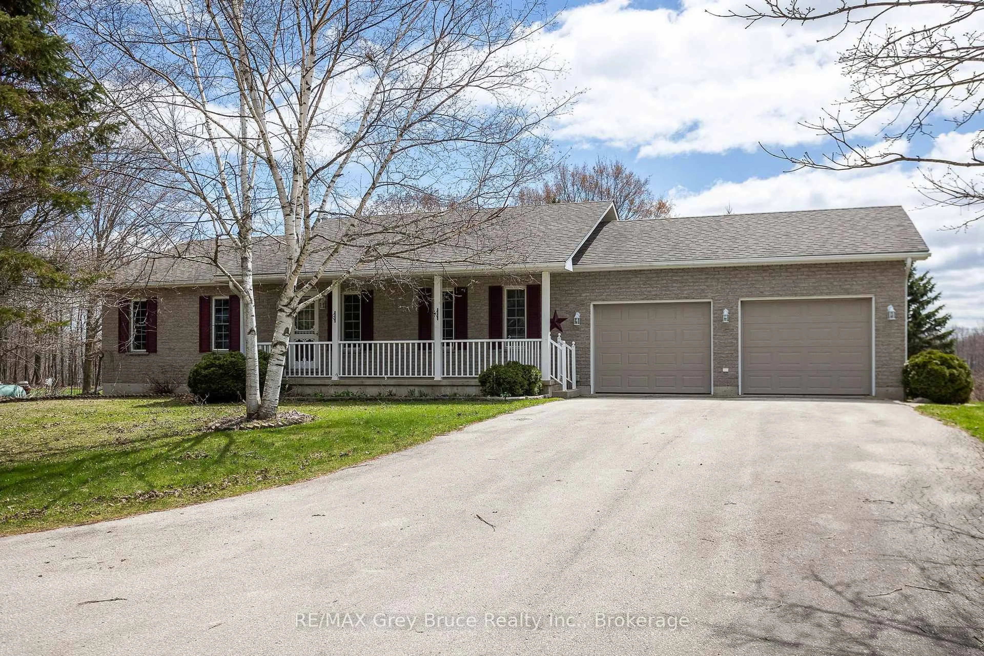 Home with vinyl exterior material, street for 258913 Gordon Sutherland Pkwy, Georgian Bluffs Ontario N4K 0G3