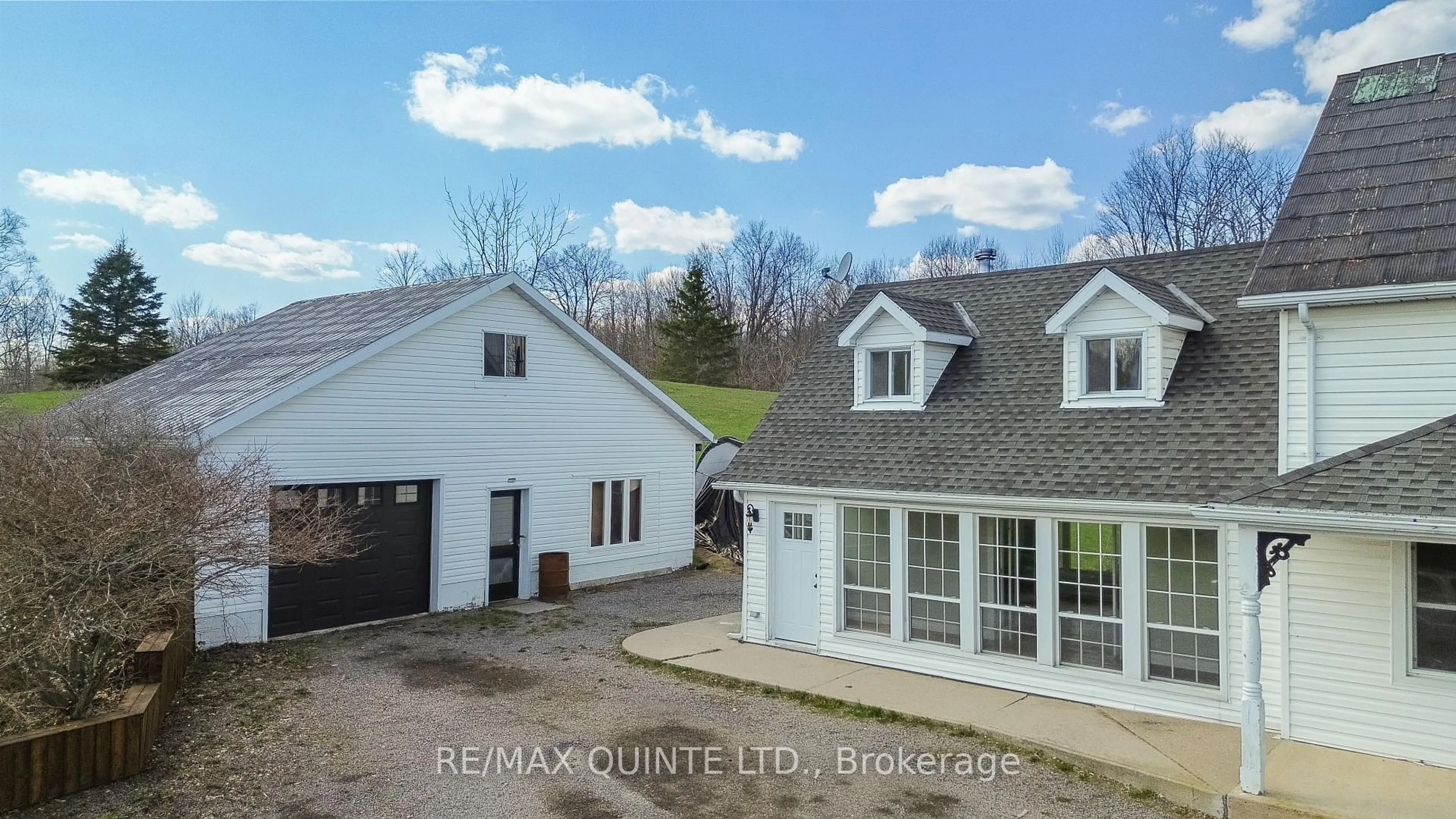 A pic from outside/outdoor area/front of a property/back of a property/a pic from drone, mountain view for 15481 Highway 62, Madoc Ontario K0K 2K0