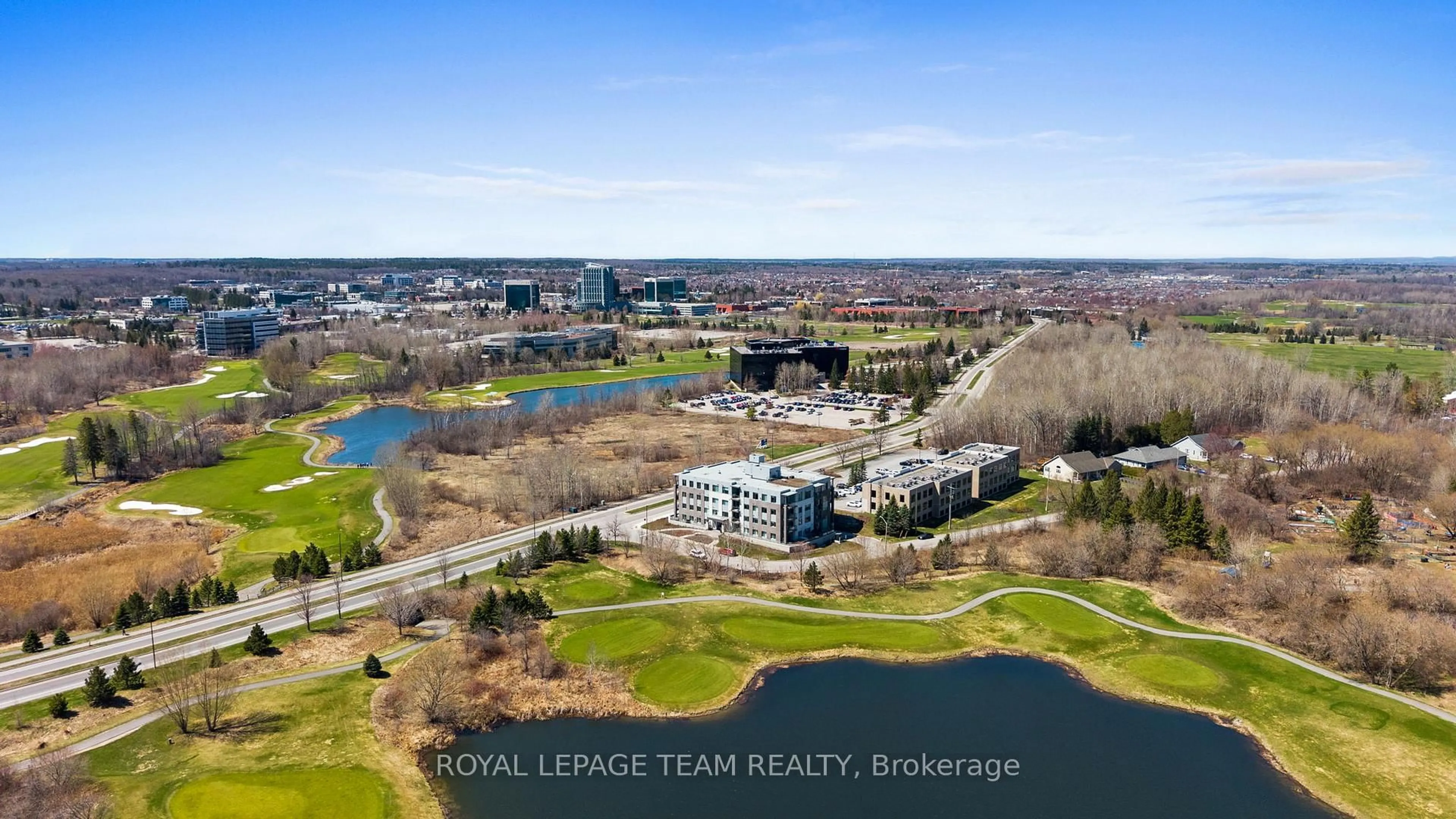 A pic from outside/outdoor area/front of a property/back of a property/a pic from drone, water/lake/river/ocean view for 280 Herzberg Rd #103, Ottawa Ontario K2K 0N8