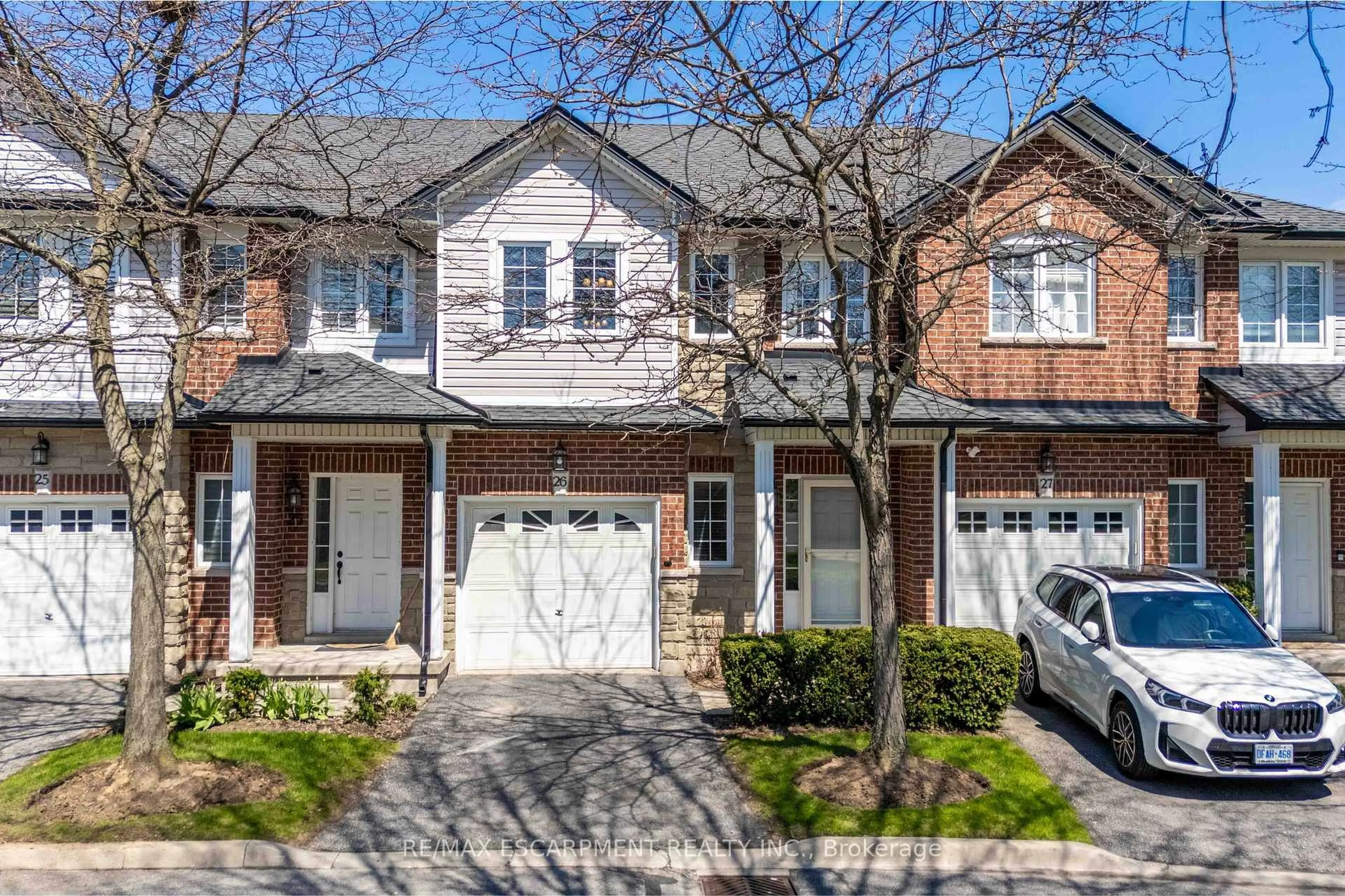 Home with brick exterior material, street for 232 Stonehenge Dr #26, Hamilton Ontario L9K 1R5