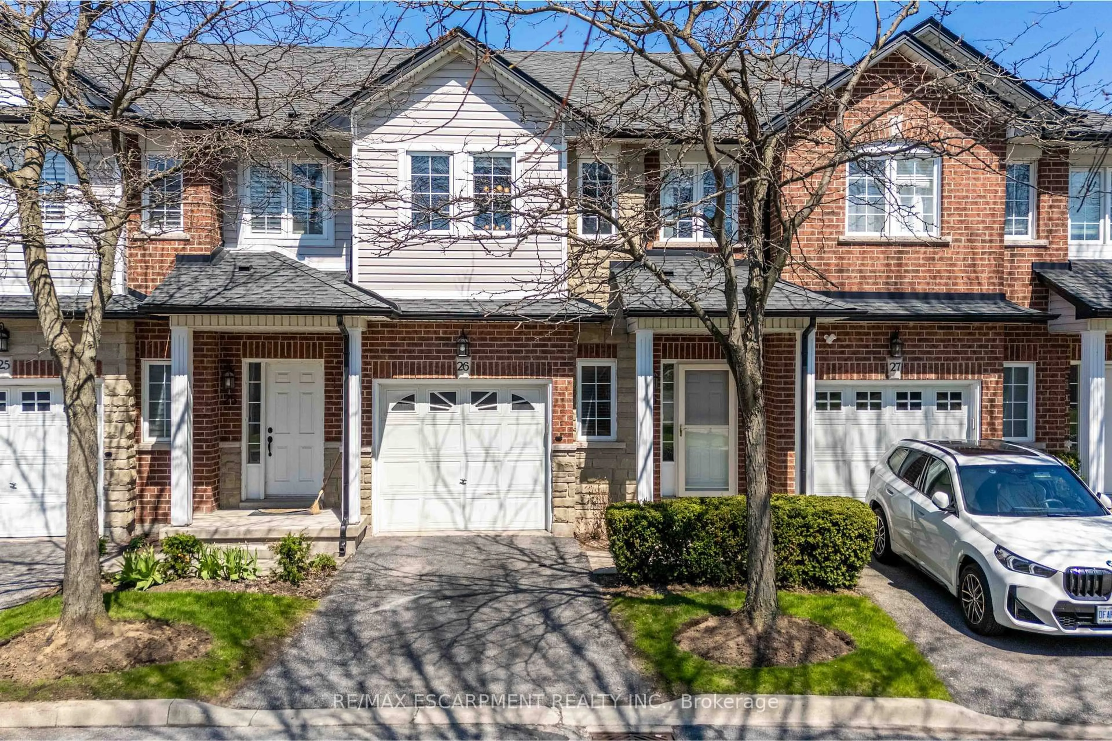 Home with brick exterior material, street for 232 Stonehenge Dr #26, Hamilton Ontario L9K 1R5