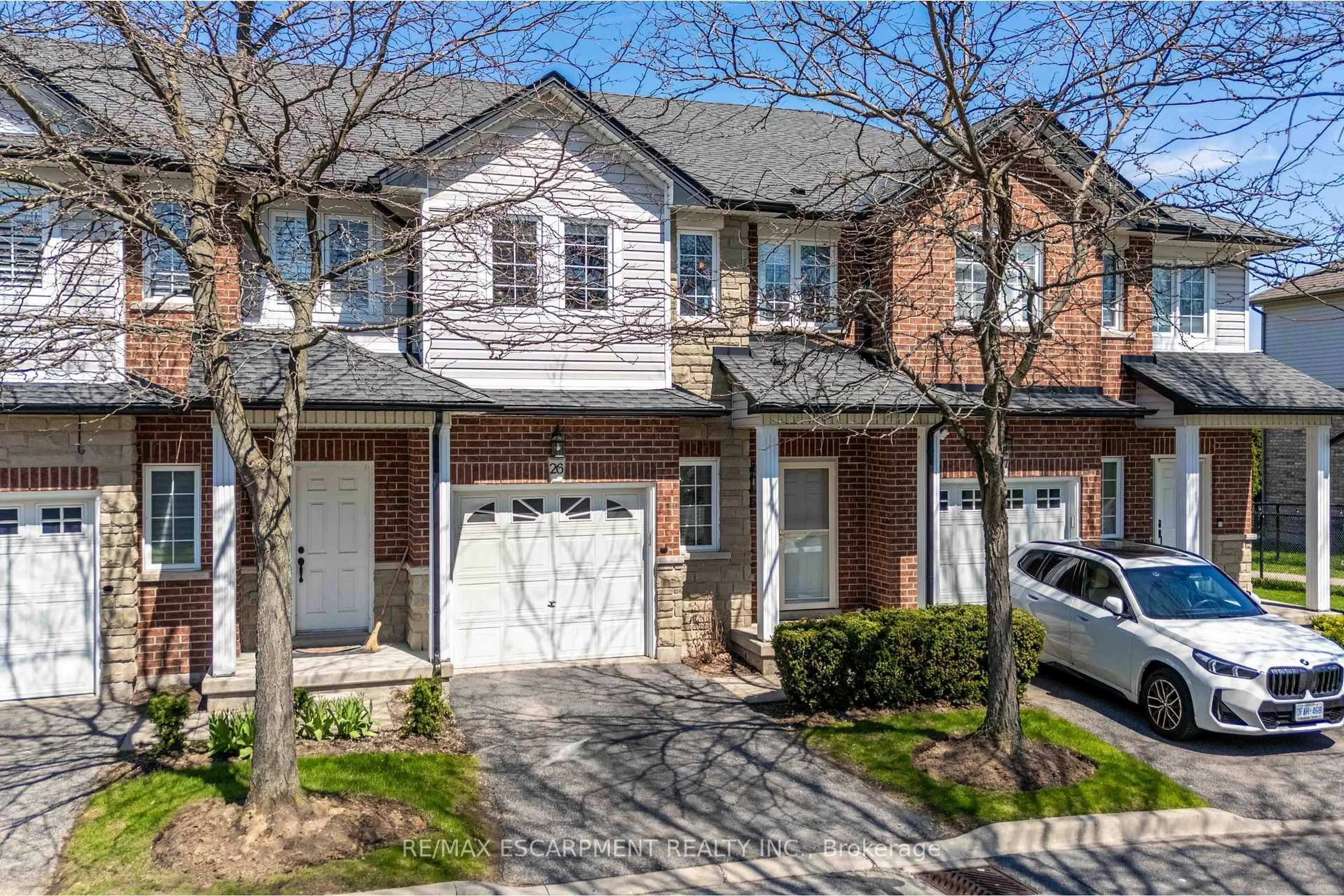 Home with brick exterior material, street for 232 Stonehenge Dr #26, Hamilton Ontario L9K 1R5