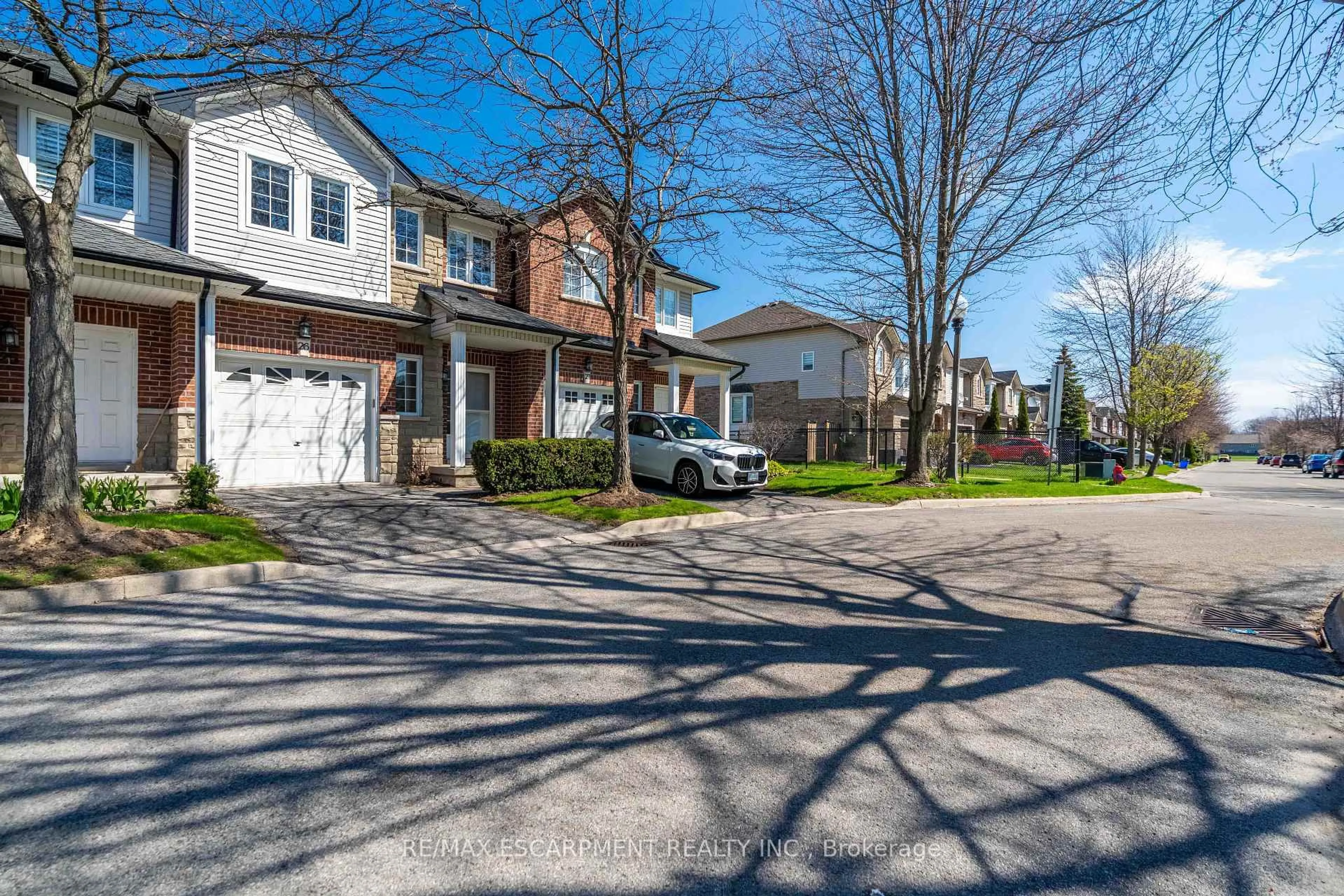 A pic from outside/outdoor area/front of a property/back of a property/a pic from drone, street for 232 Stonehenge Dr #26, Hamilton Ontario L9K 1R5