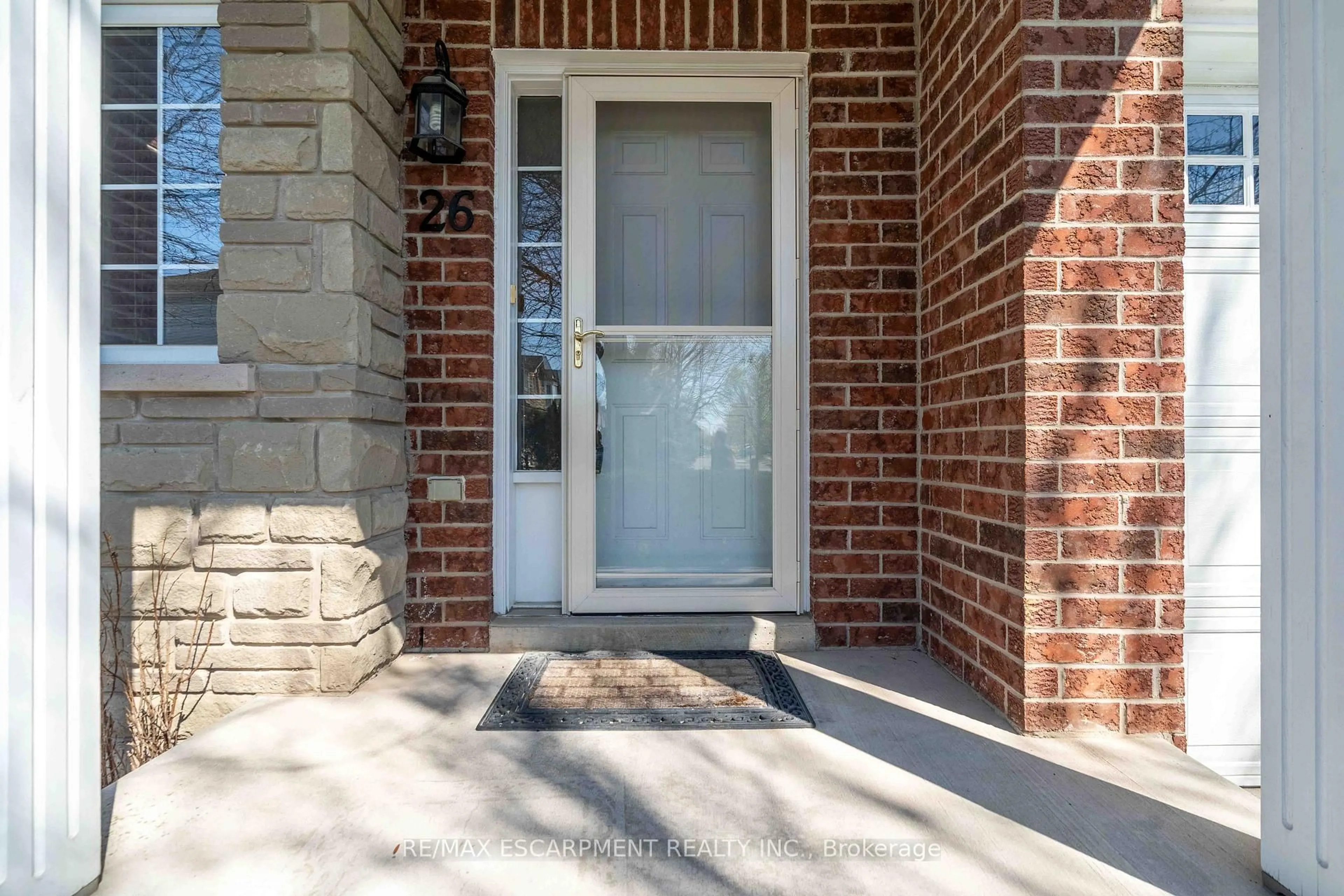 Home with brick exterior material, street for 232 Stonehenge Dr #26, Hamilton Ontario L9K 1R5