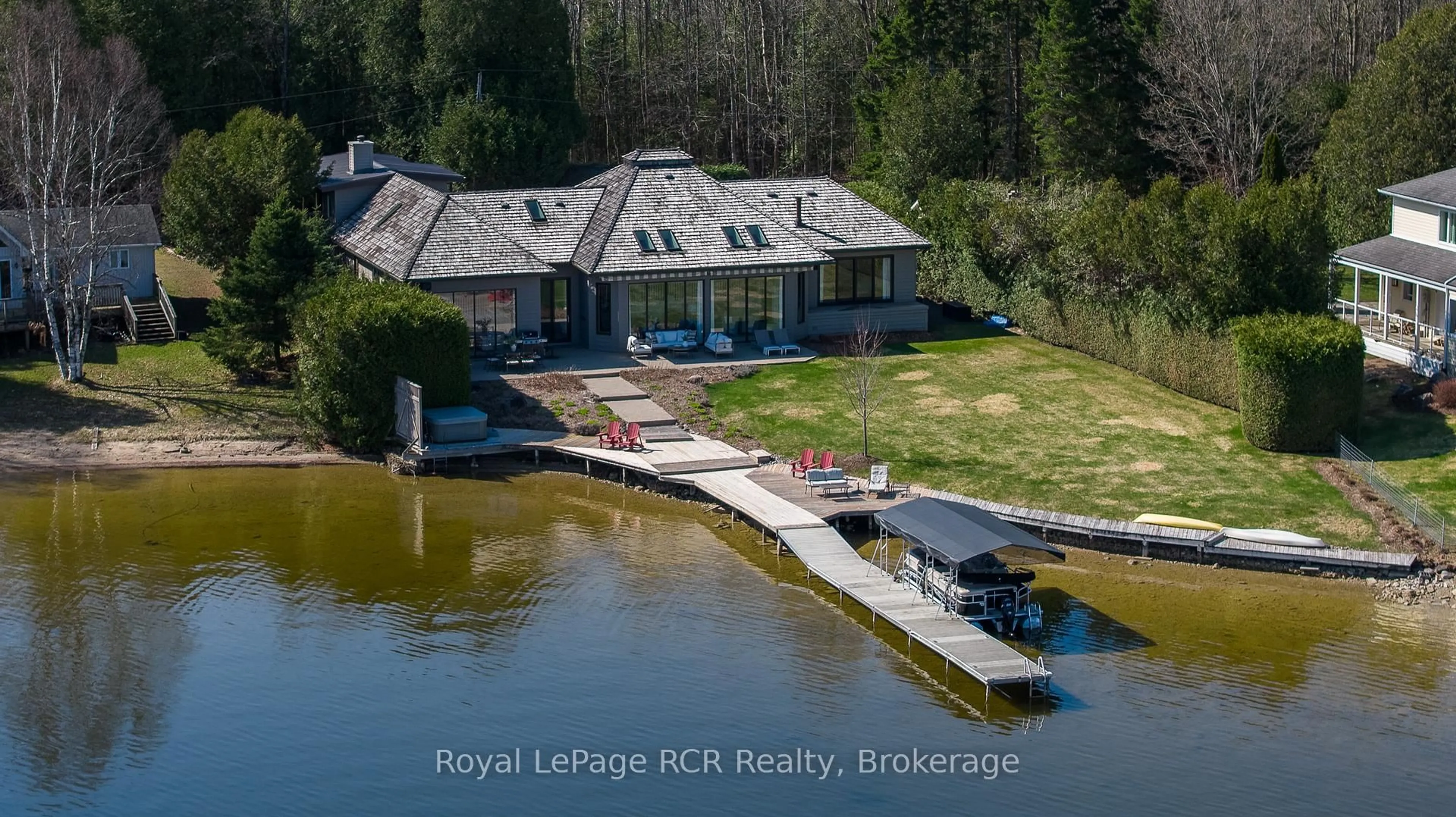 A pic from outside/outdoor area/front of a property/back of a property/a pic from drone, water/lake/river/ocean view for 139 South Shores Rd, Grey Highlands Ontario N0C 1E0