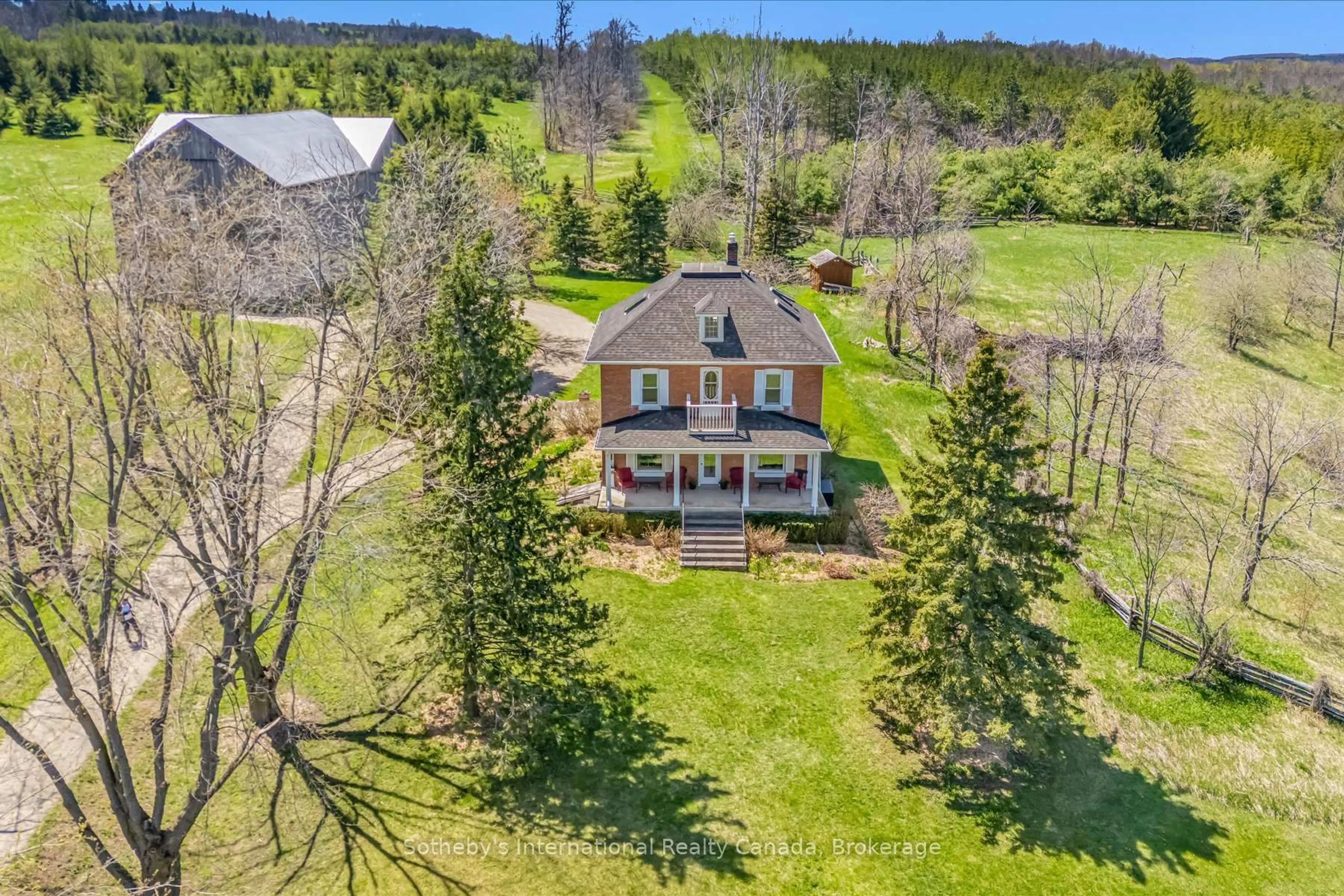 A pic from outside/outdoor area/front of a property/back of a property/a pic from drone, unknown for 717218 1st Line, Mulmur Ontario L9V 0G2