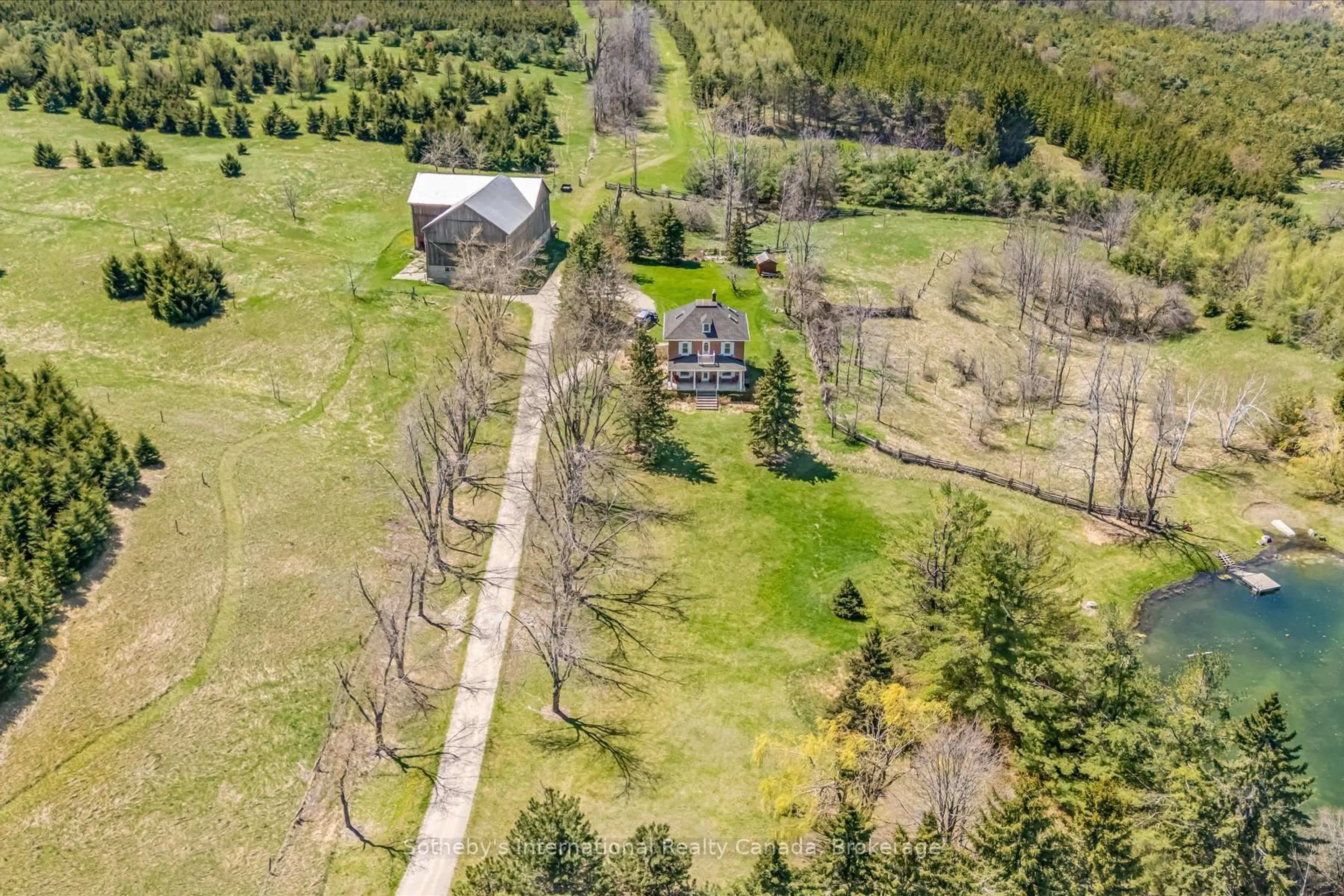 A pic from outside/outdoor area/front of a property/back of a property/a pic from drone, forest/trees view for 717218 1st Line, Mulmur Ontario L9V 0G2