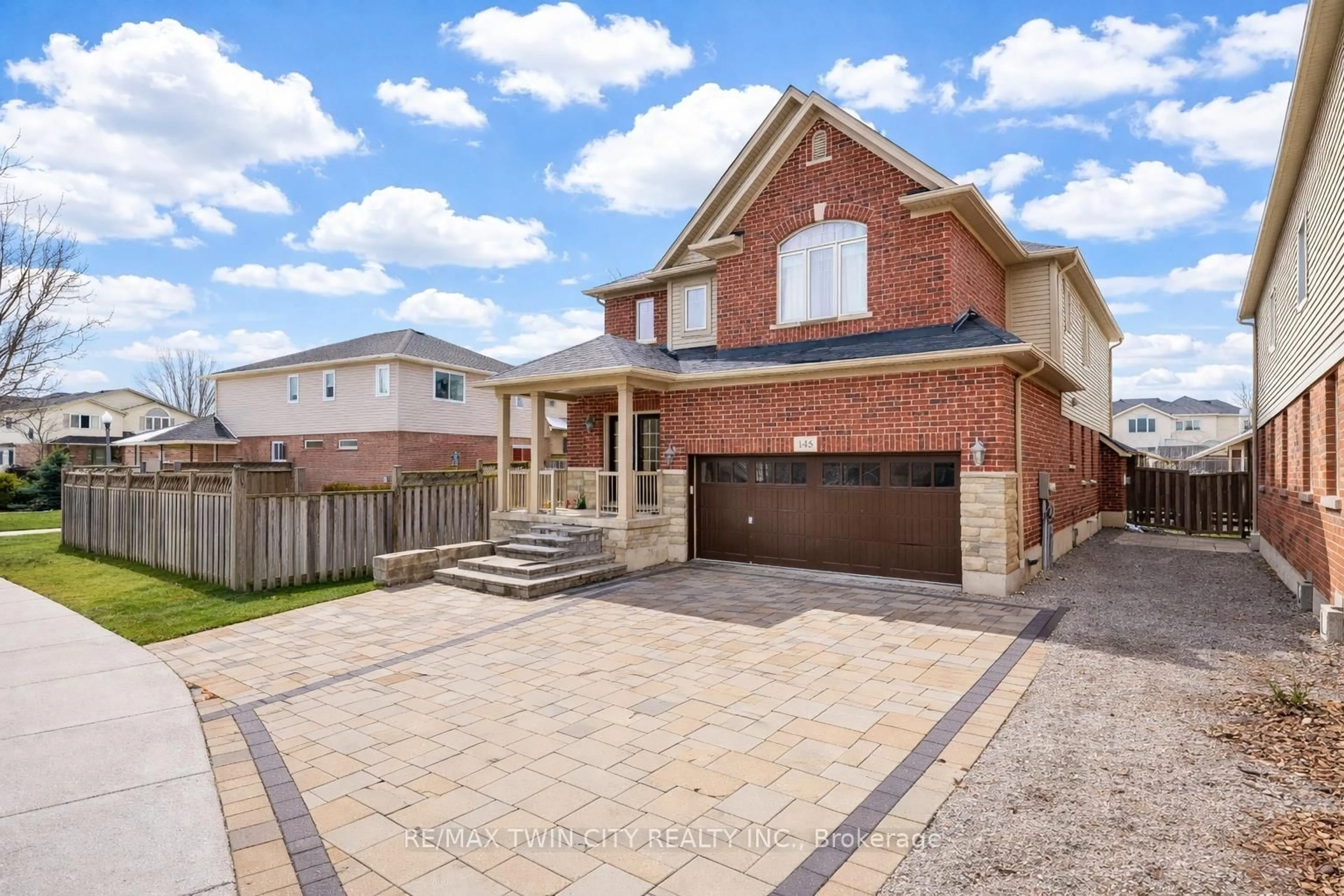 Home with brick exterior material, street for 145 Redtail St, Kitchener Ontario N2K 4J5