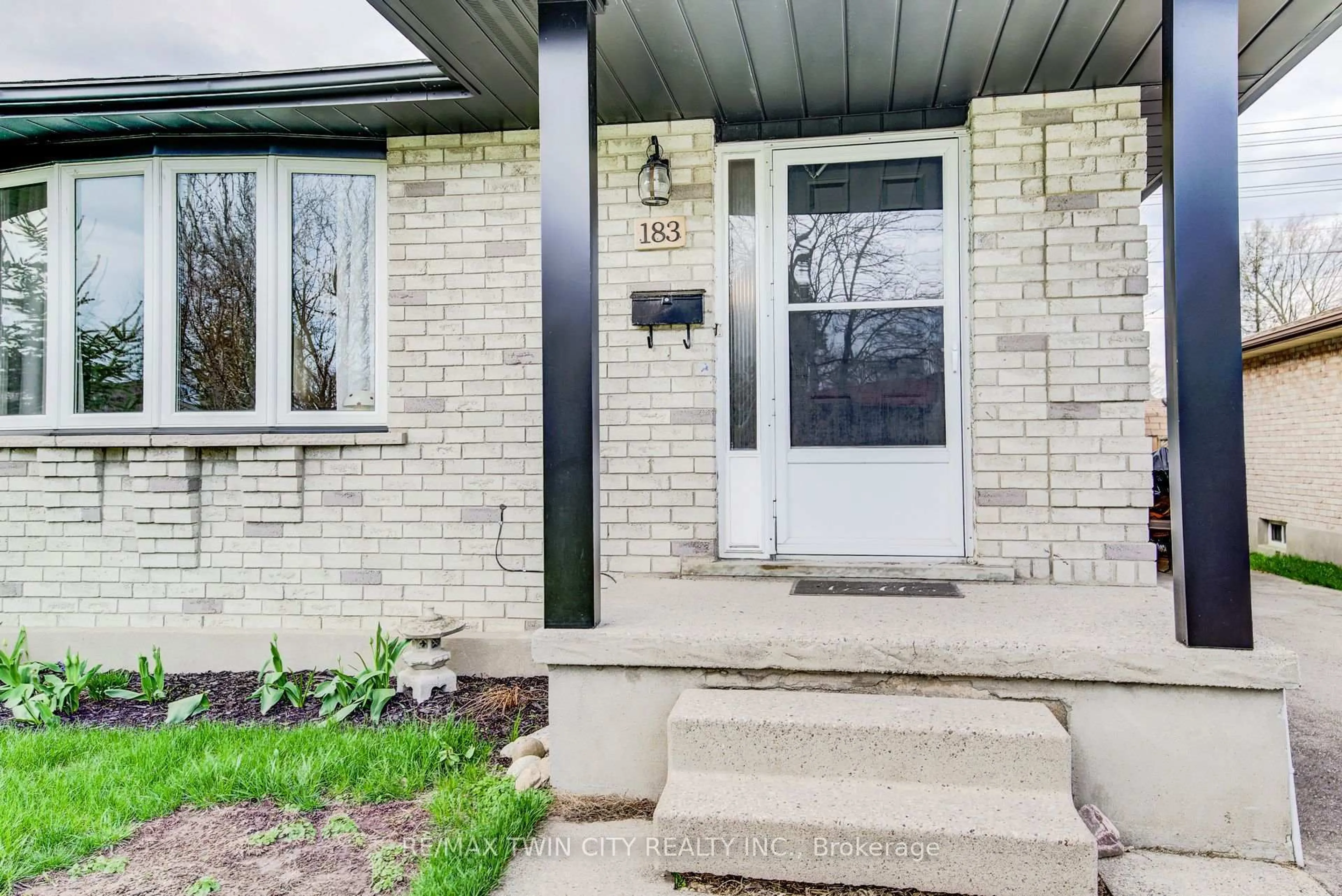 Home with brick exterior material, street for 183 Dinison Cres, Kitchener Ontario N2E 2S6