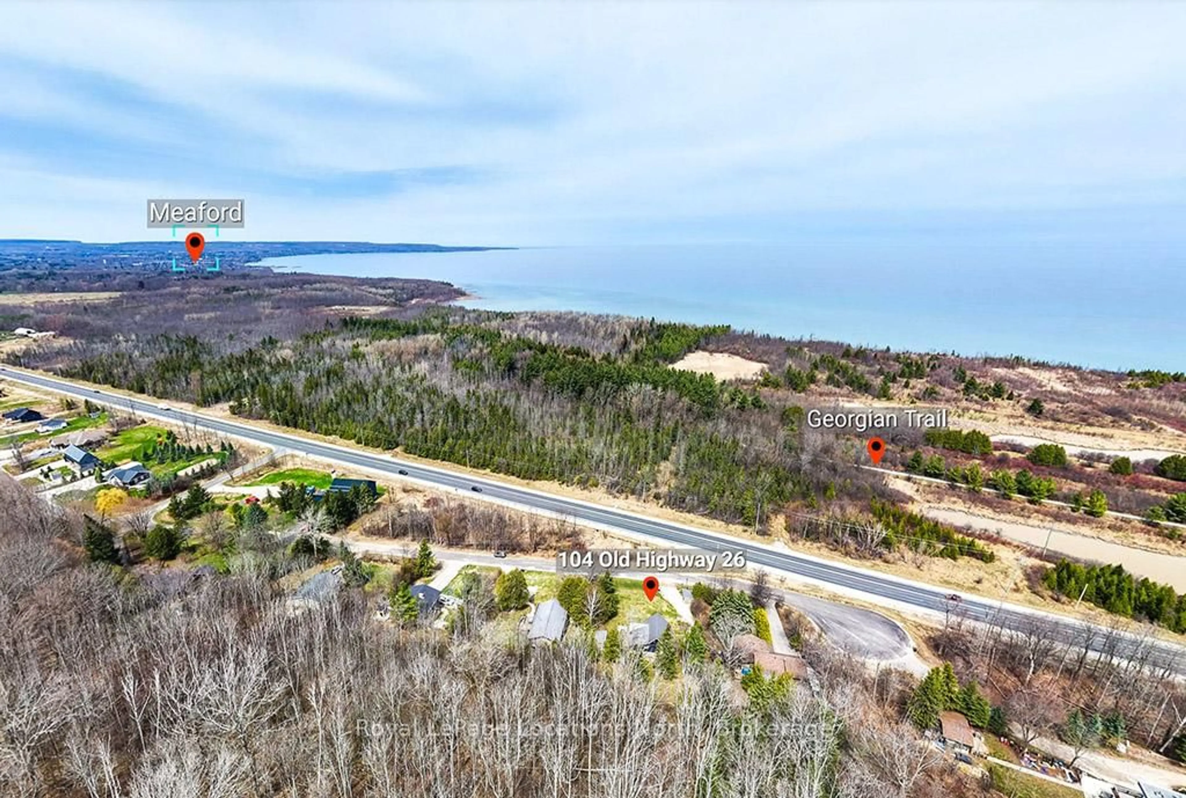 A pic from outside/outdoor area/front of a property/back of a property/a pic from drone, water/lake/river/ocean view for 104 Old 26 Highway, Meaford Ontario N4L 1W7