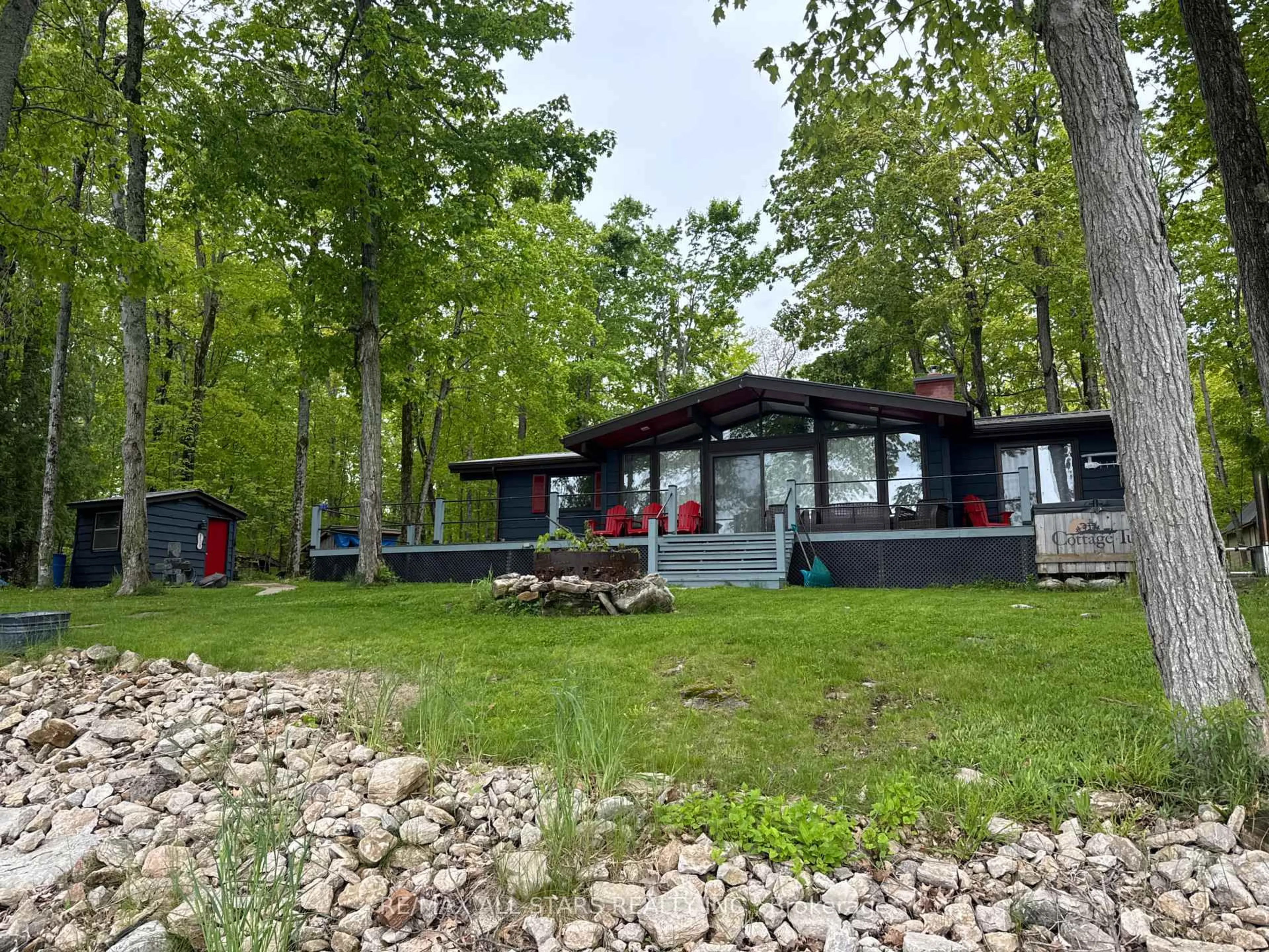 A pic from outside/outdoor area/front of a property/back of a property/a pic from drone, unknown for 686 Grand Island Rd, Kawartha Lakes Ontario K6H 5R7