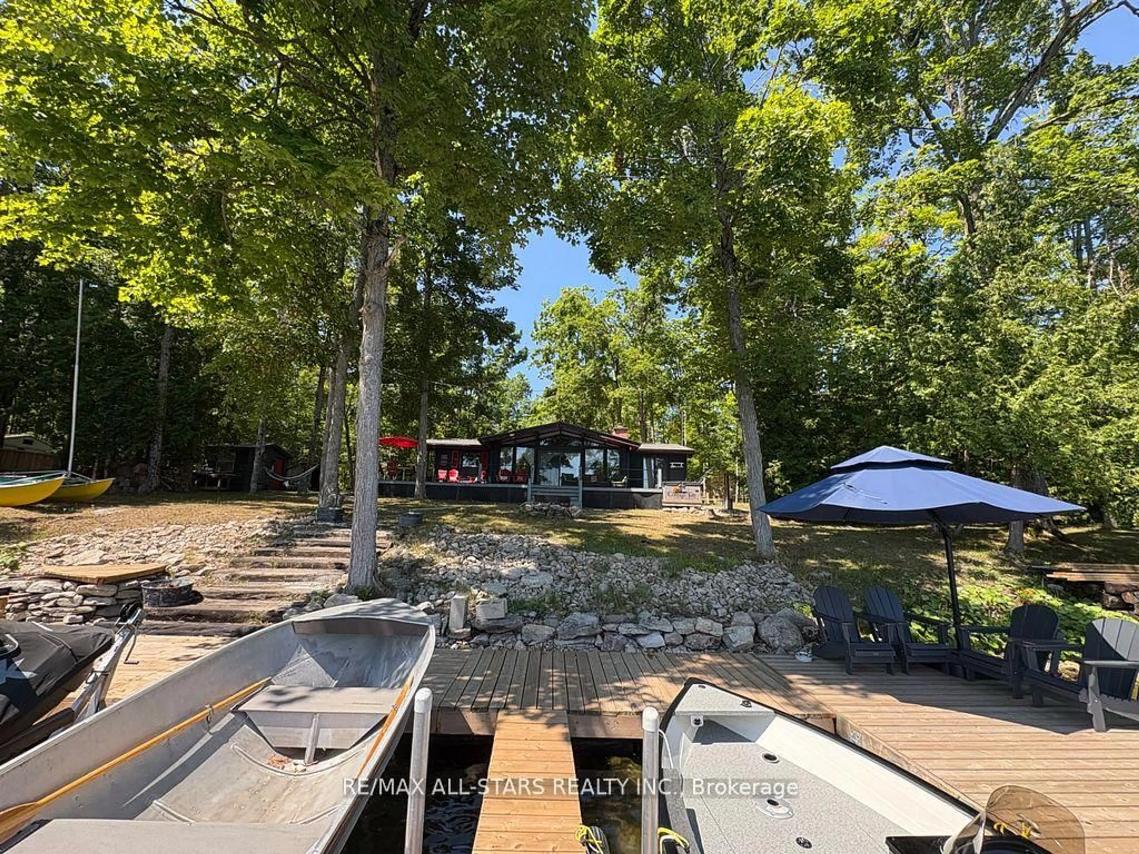 A pic from outside/outdoor area/front of a property/back of a property/a pic from drone, water/lake/river/ocean view for 686 Grand Island Rd, Kawartha Lakes Ontario K6H 5R7