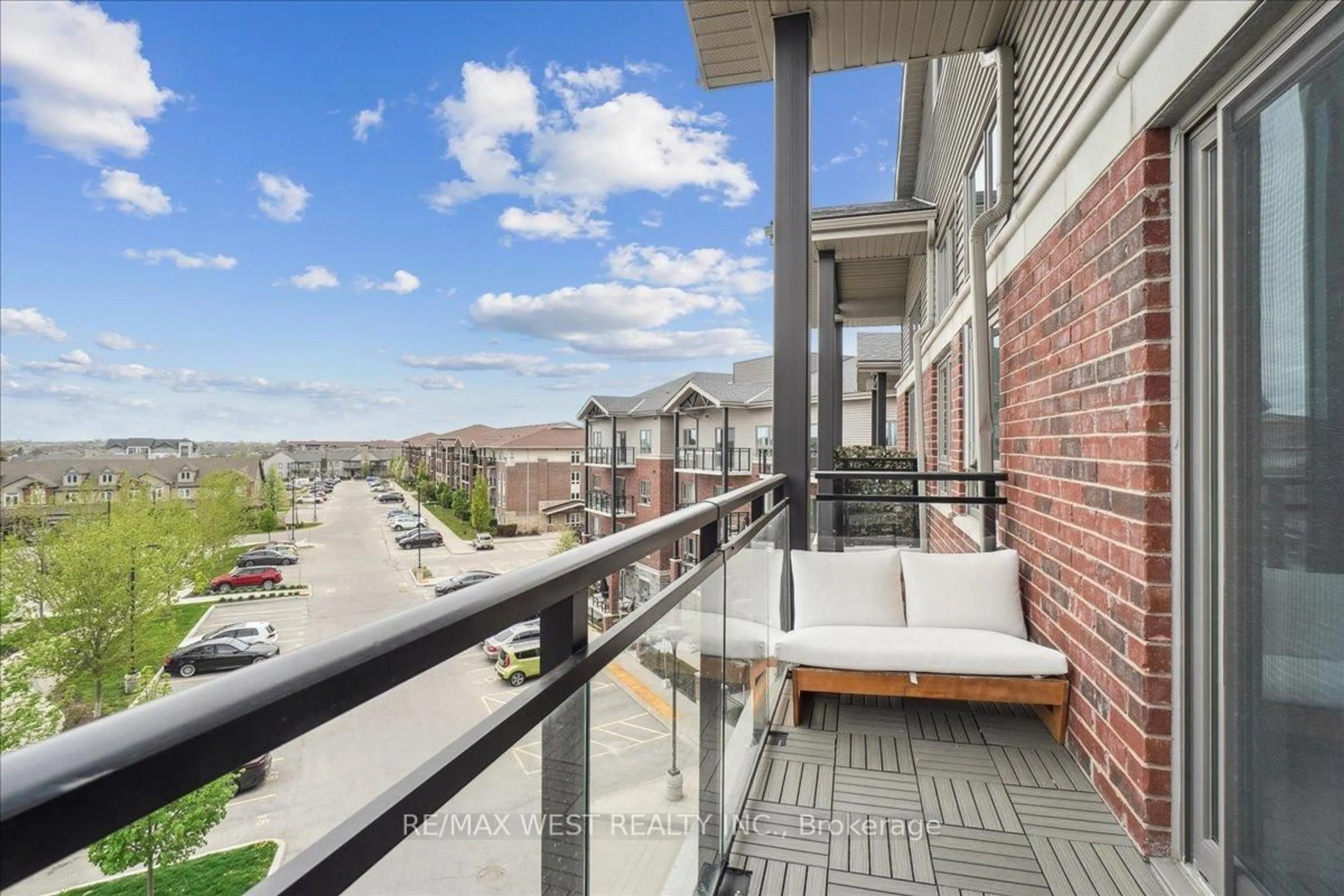 Balcony in the apartment, city buildings view from balcony for 35 Kingsbury Sq #413, Guelph Ontario N1L 0J4