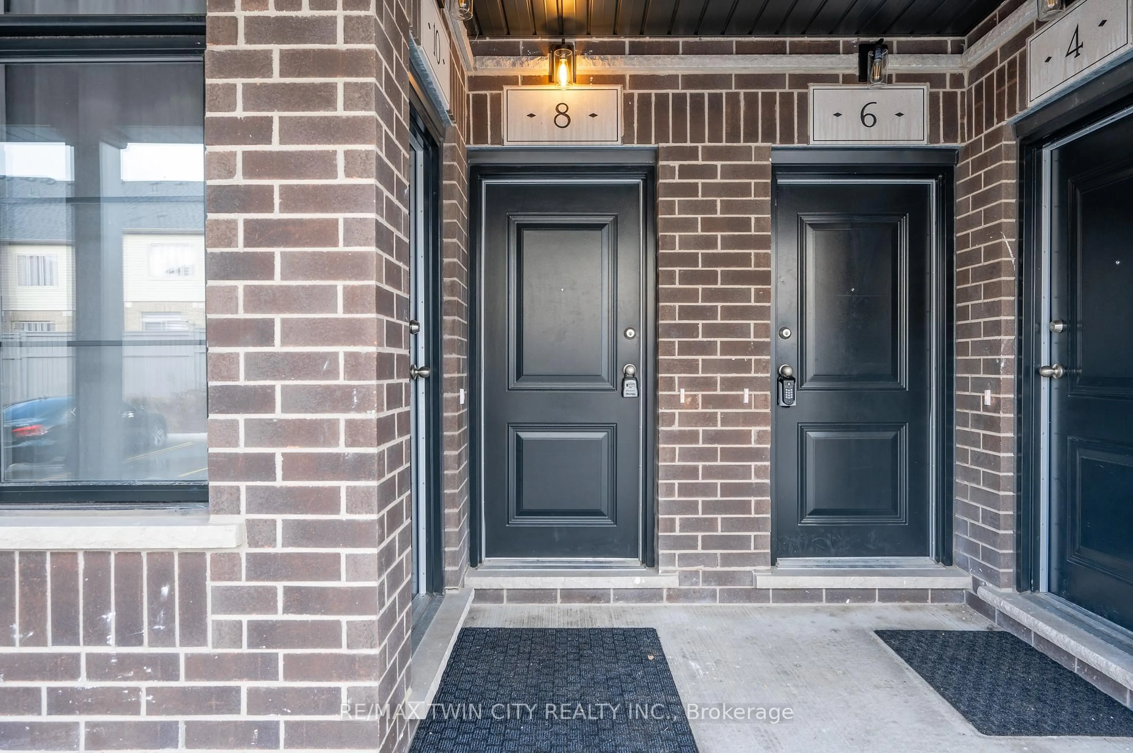 Home with brick exterior material, street for 8 Oat Lane, Kitchener Ontario N2R 0T1