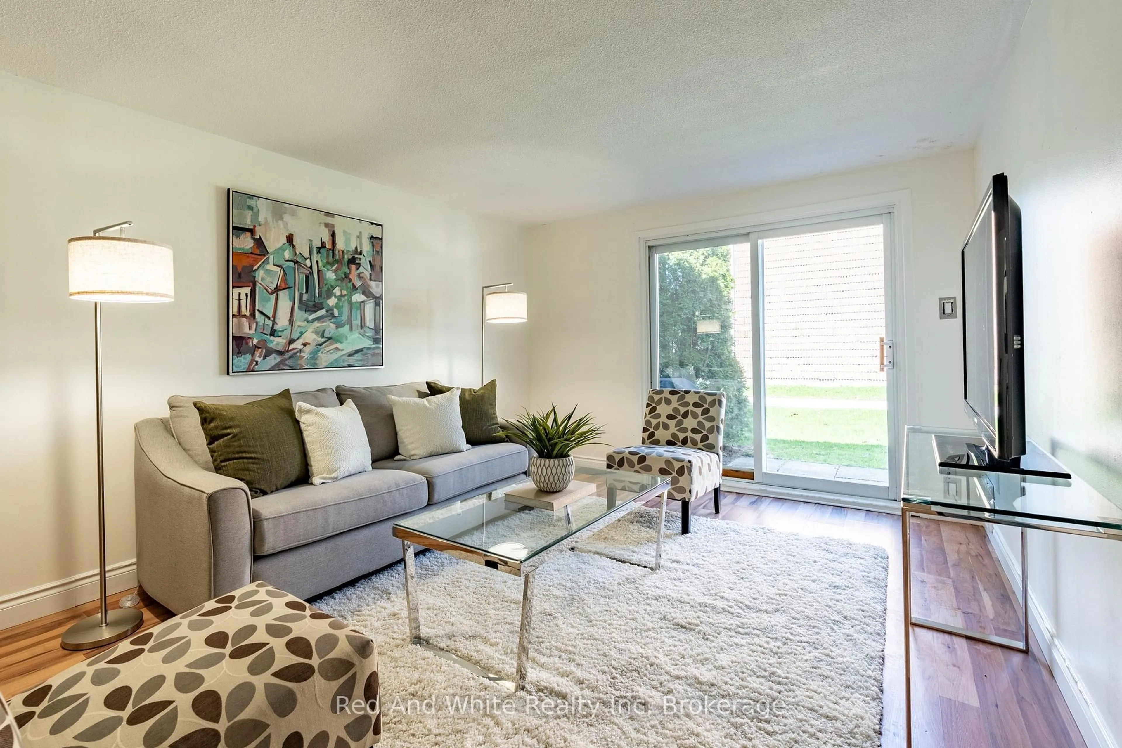 Living room with furniture, carpet floor for 65 Glamis Rd #80, Cambridge Ontario N1R 6W4