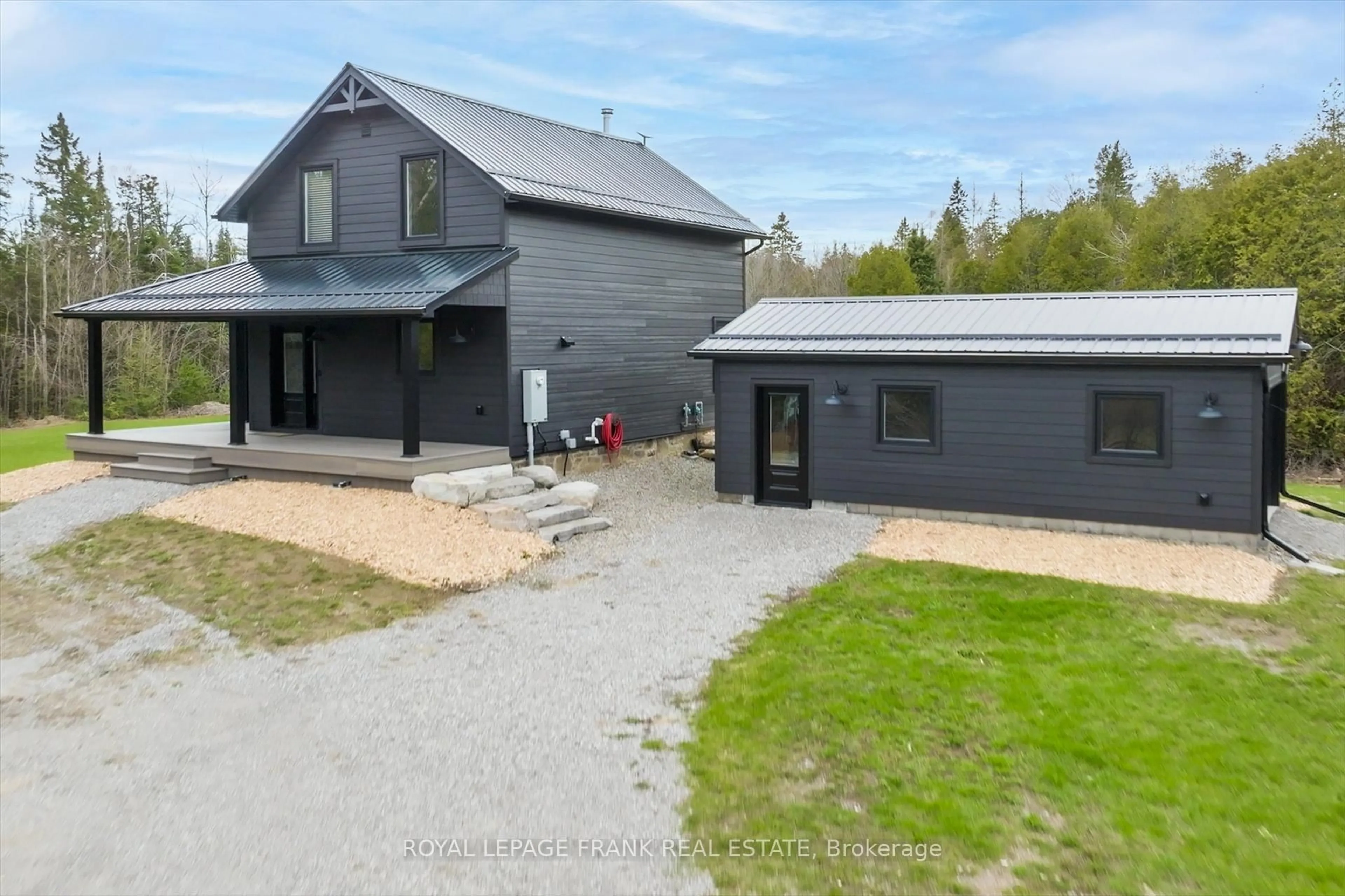 A pic from outside/outdoor area/front of a property/back of a property/a pic from drone, unknown for 165 County Rd 507, Trent Lakes Ontario K0L 1J0