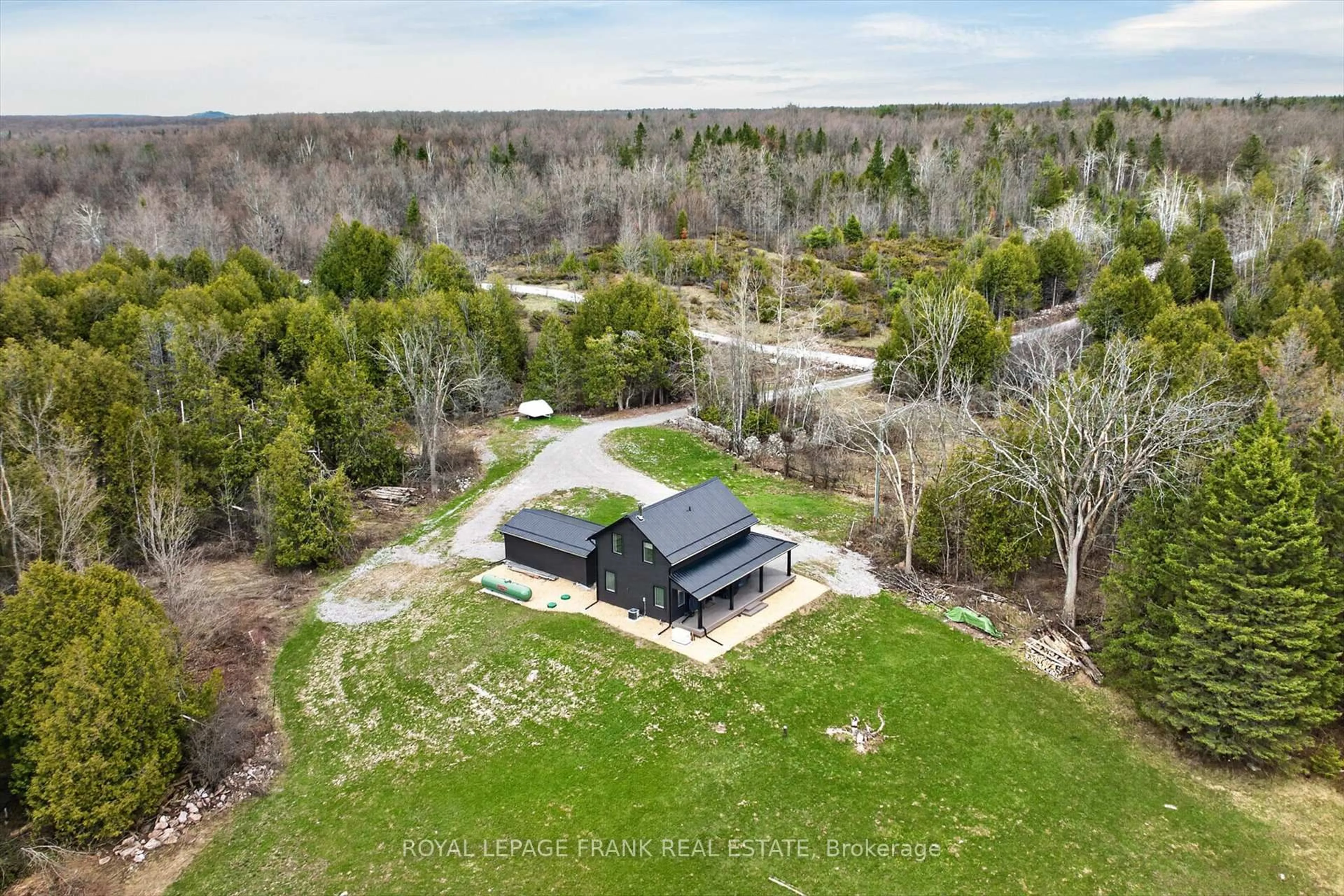 A pic from outside/outdoor area/front of a property/back of a property/a pic from drone, unknown for 165 County Rd 507, Trent Lakes Ontario K0L 1J0