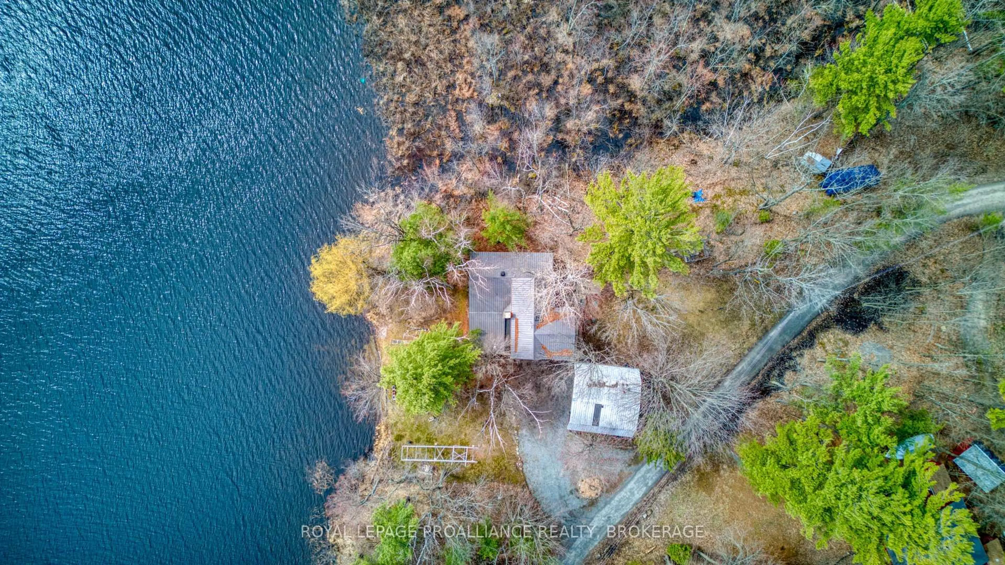 A pic from outside/outdoor area/front of a property/back of a property/a pic from drone, water/lake/river/ocean view for 1198 Narrows Lane, Perth Road Ontario K0H 2L0