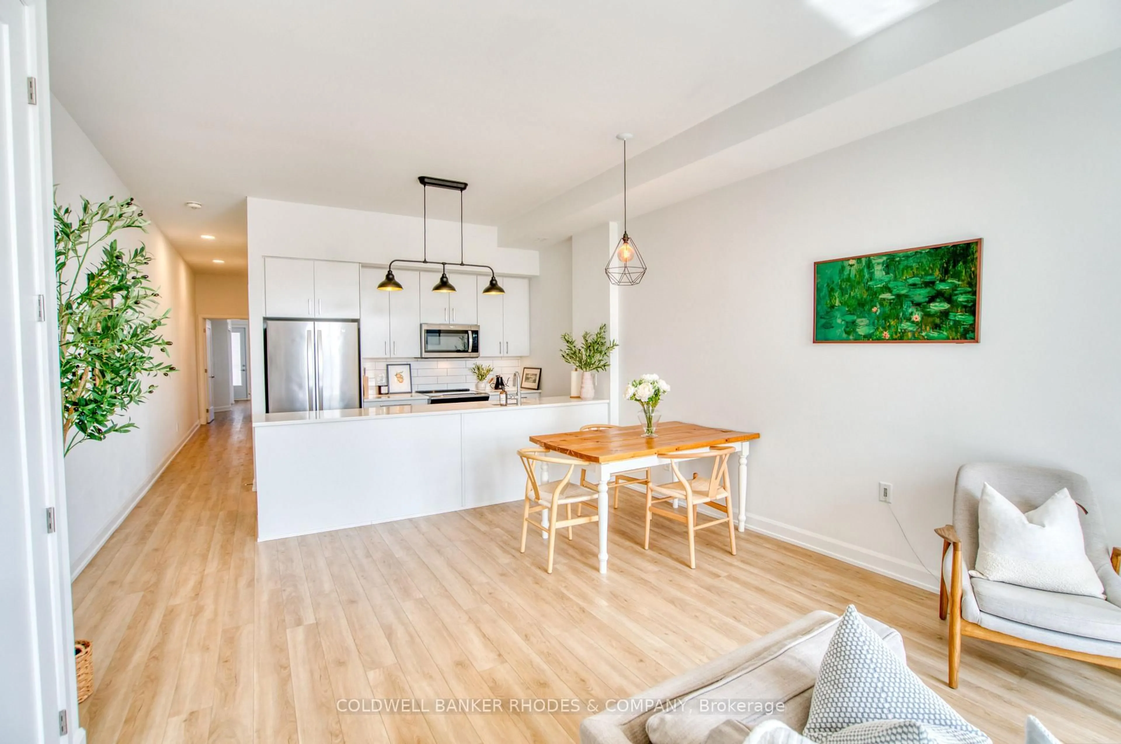 Open concept kitchen, wood/laminate floor for 515 Gladstone Ave #5, Ottawa Ontario K1R 5N9