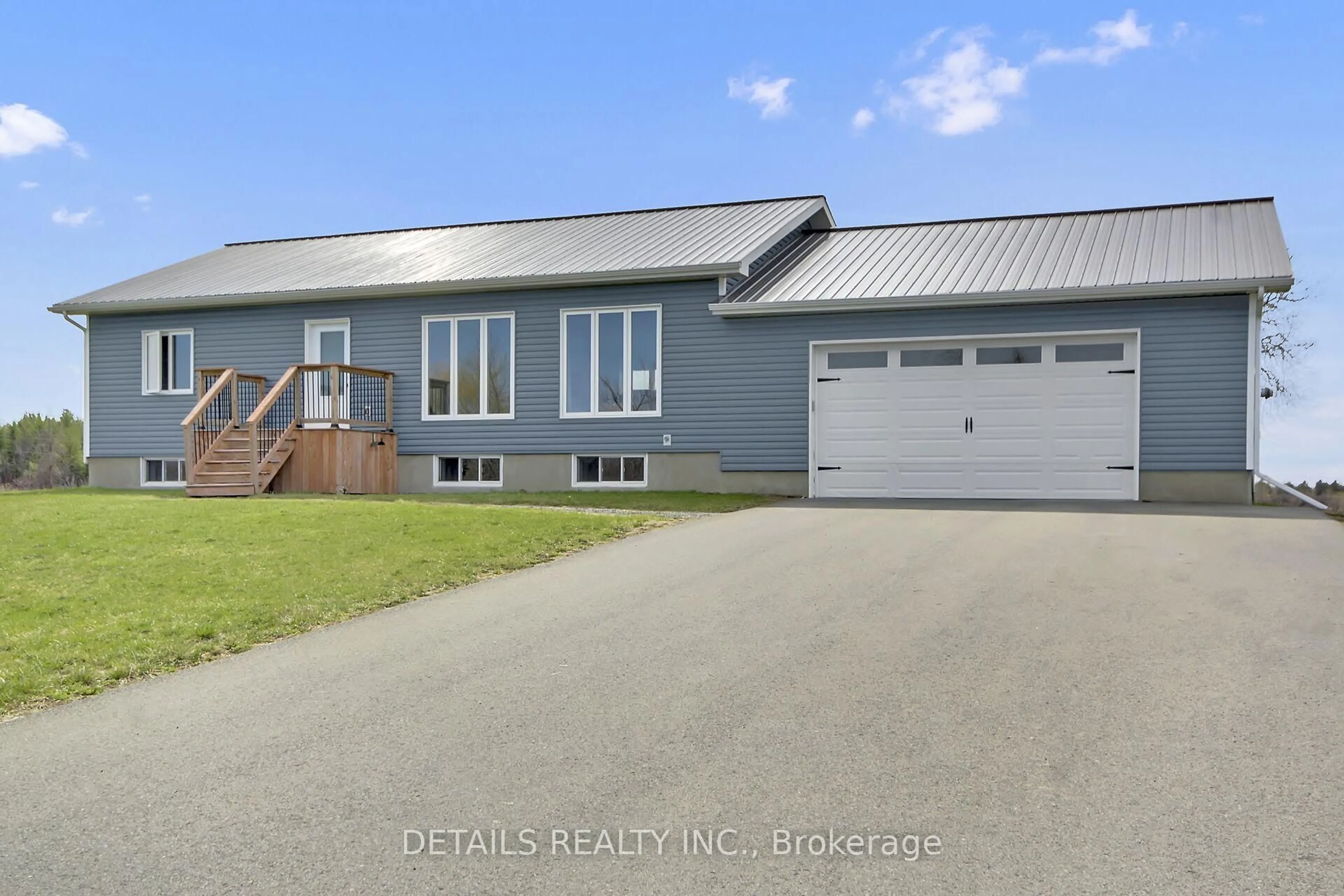 Home with vinyl exterior material, street for 1408 Merkley Rd, North Dundas Ontario K0C 2K0