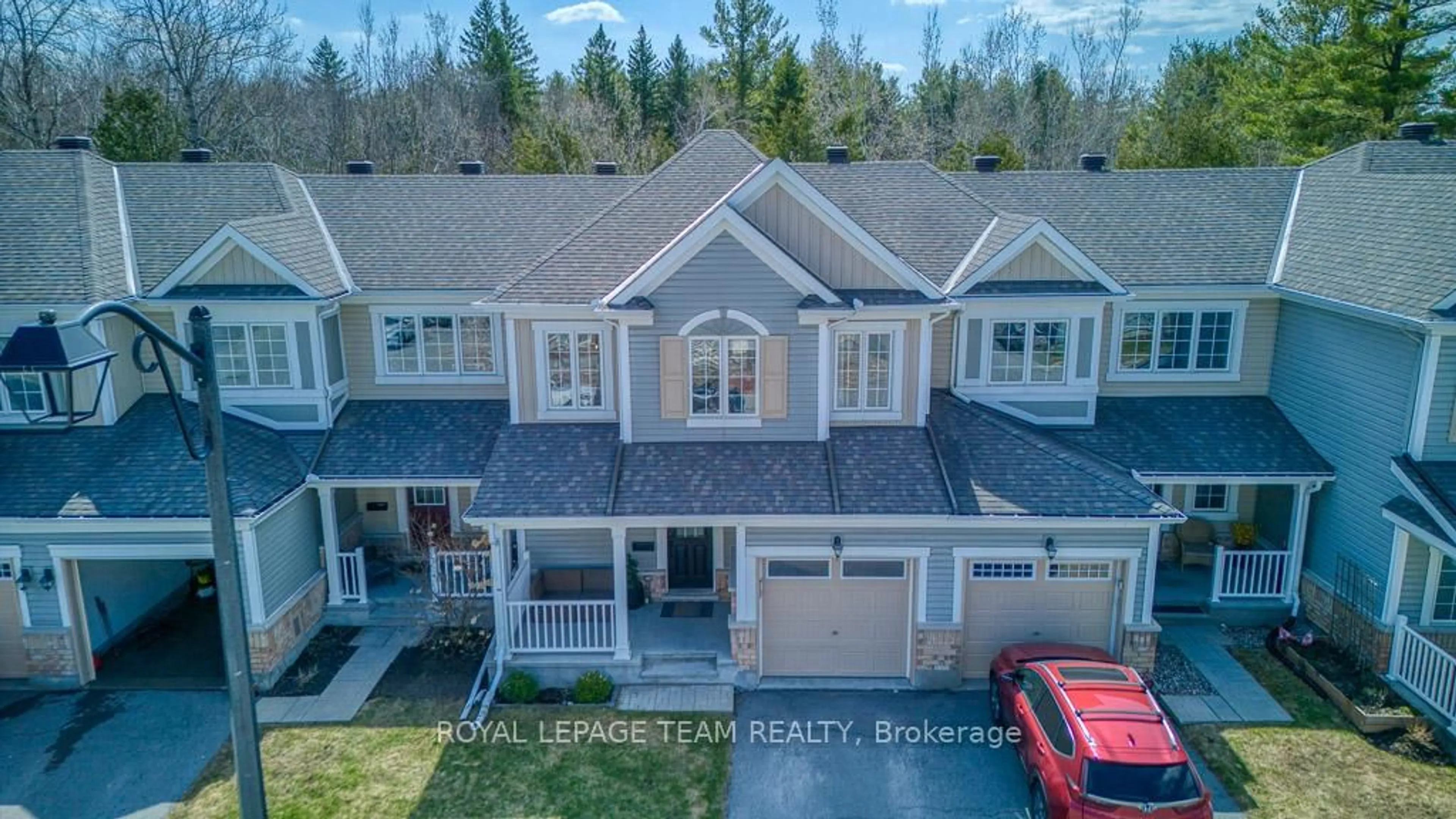 A pic from outside/outdoor area/front of a property/back of a property/a pic from drone, unknown for 129 Maestro Ave, Ottawa Ontario K2S 0V4