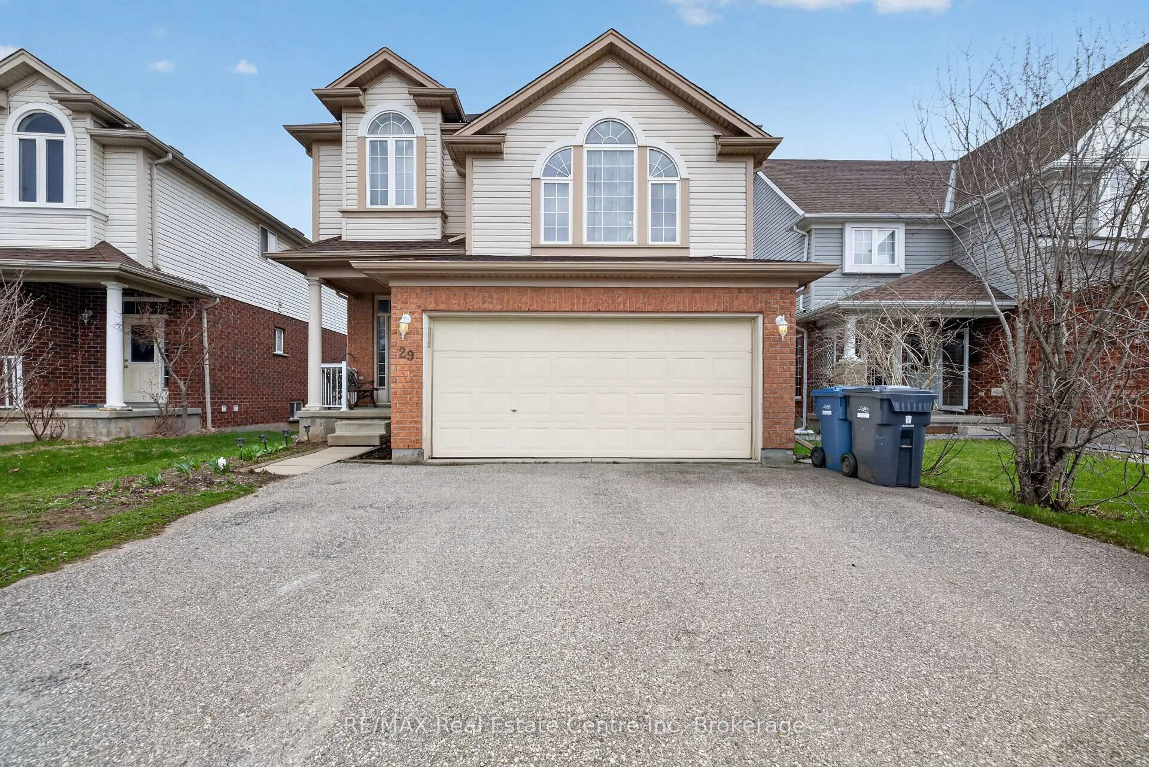 Home with vinyl exterior material, street for 29 Milson Cres, Guelph Ontario N1C 1G9