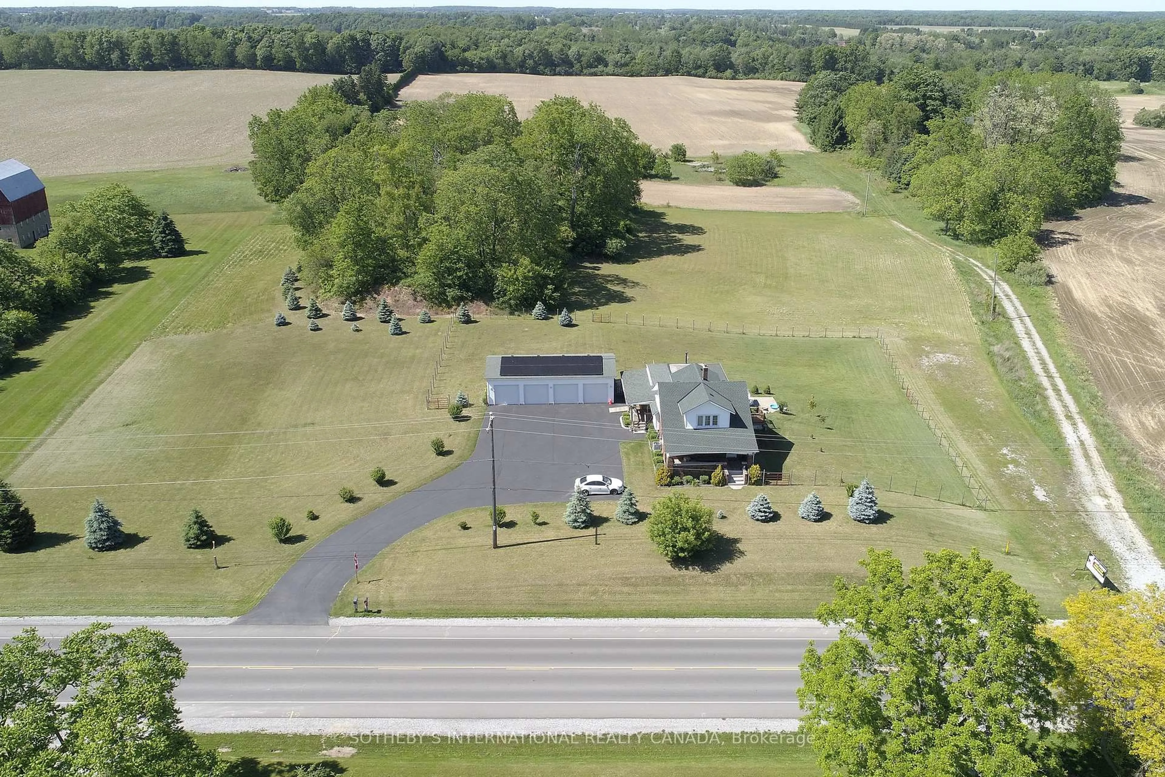 A pic from outside/outdoor area/front of a property/back of a property/a pic from drone, unknown for 589 Highway 6, Norfolk Ontario N0A 1N2
