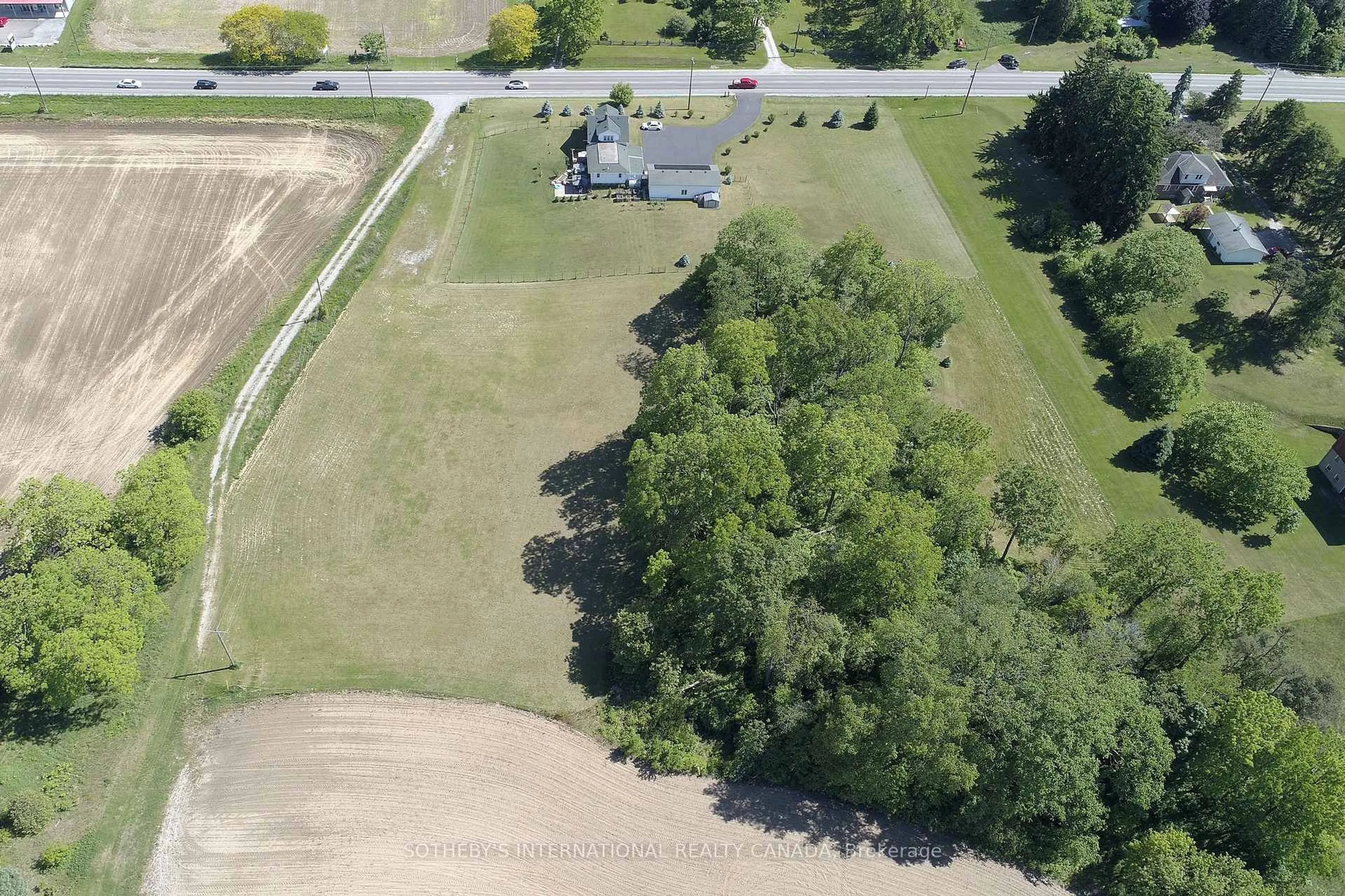 A pic from outside/outdoor area/front of a property/back of a property/a pic from drone, unknown for 589 Highway 6, Norfolk Ontario N0A 1N2