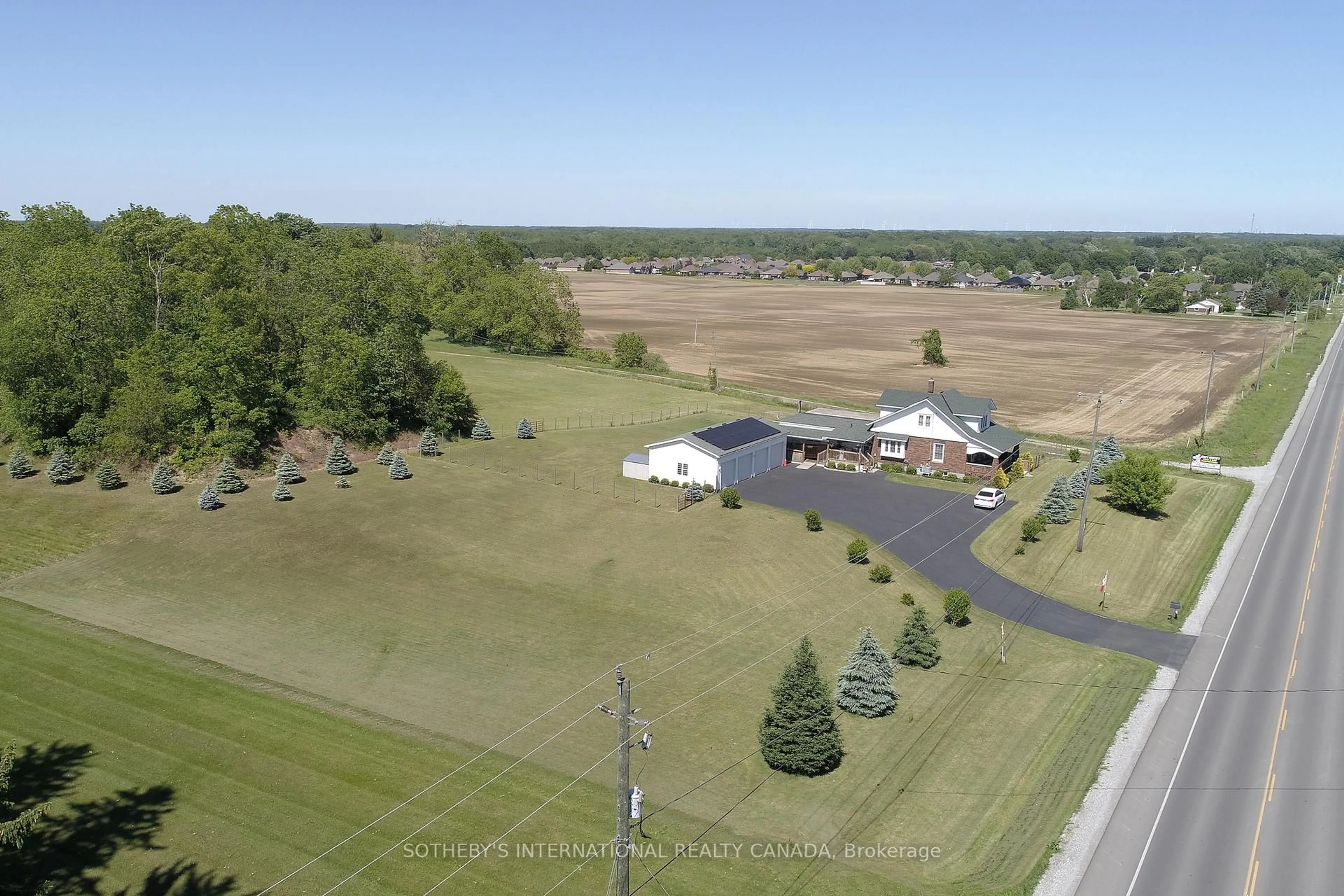 A pic from outside/outdoor area/front of a property/back of a property/a pic from drone, water/lake/river/ocean view for 589 Highway 6, Norfolk Ontario N0A 1N2