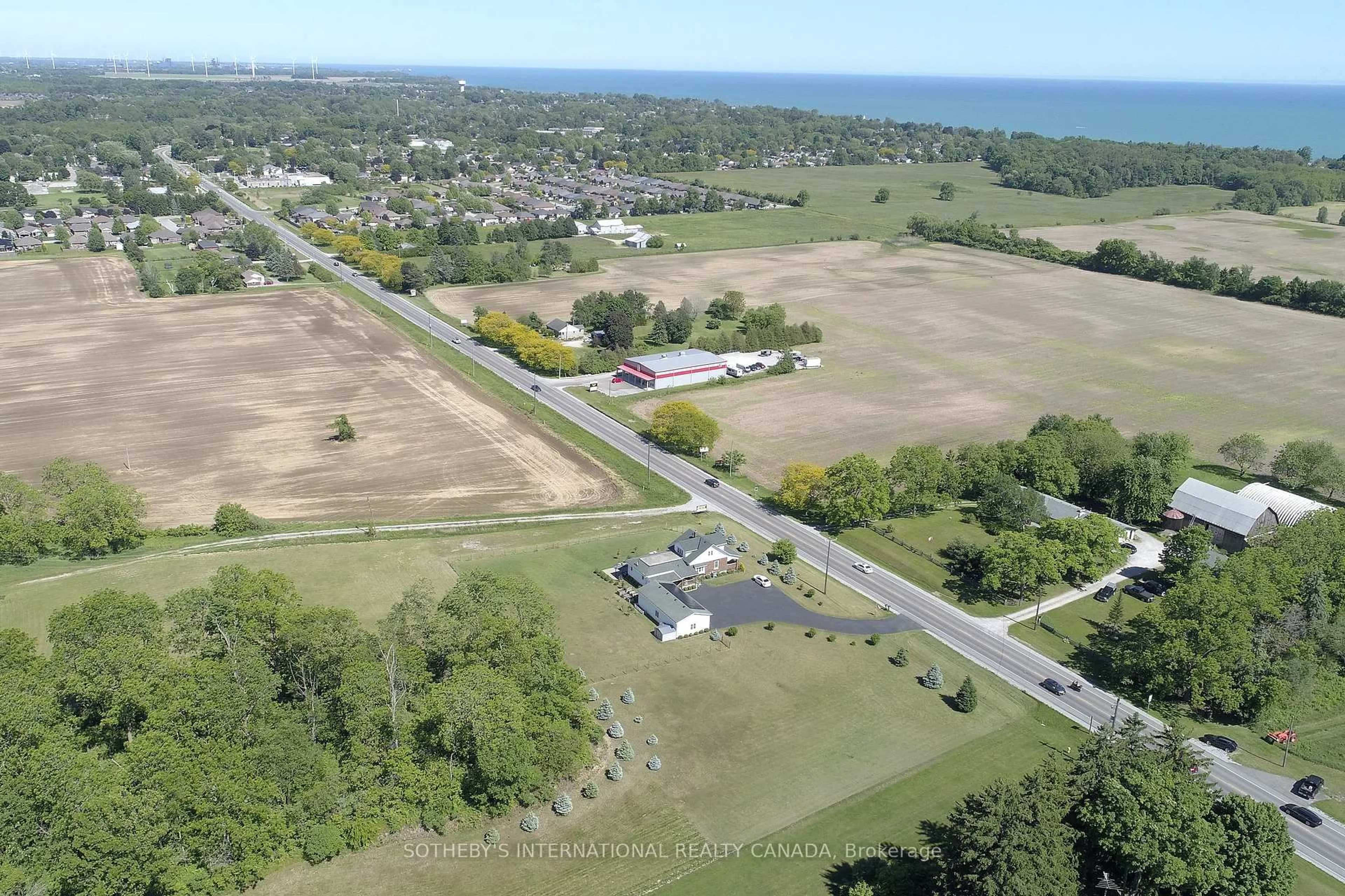 A pic from outside/outdoor area/front of a property/back of a property/a pic from drone, water/lake/river/ocean view for 589 Highway 6, Norfolk Ontario N0A 1N2